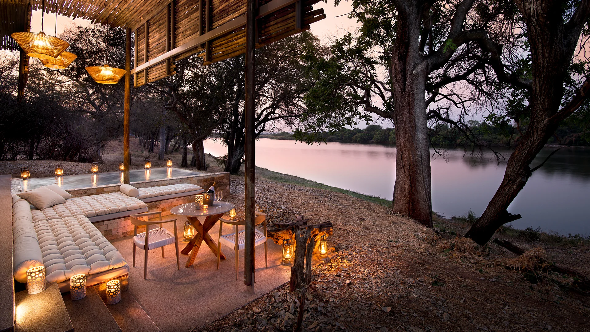 matetsi-river-lodge-suite-at-dusk-with-lanterns-overlooking-themighty-zambezi-on-a-luxury-safari-in-zimbabwe.jpg