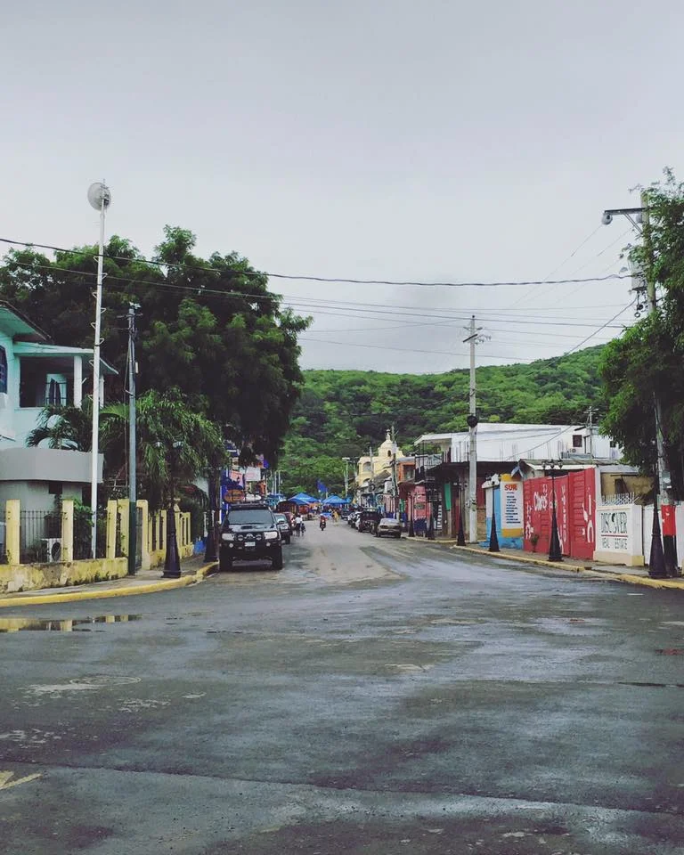 One of the main streets of the city San Juan Del Sur, Nicaragua next to the ATM and the international fishing port.