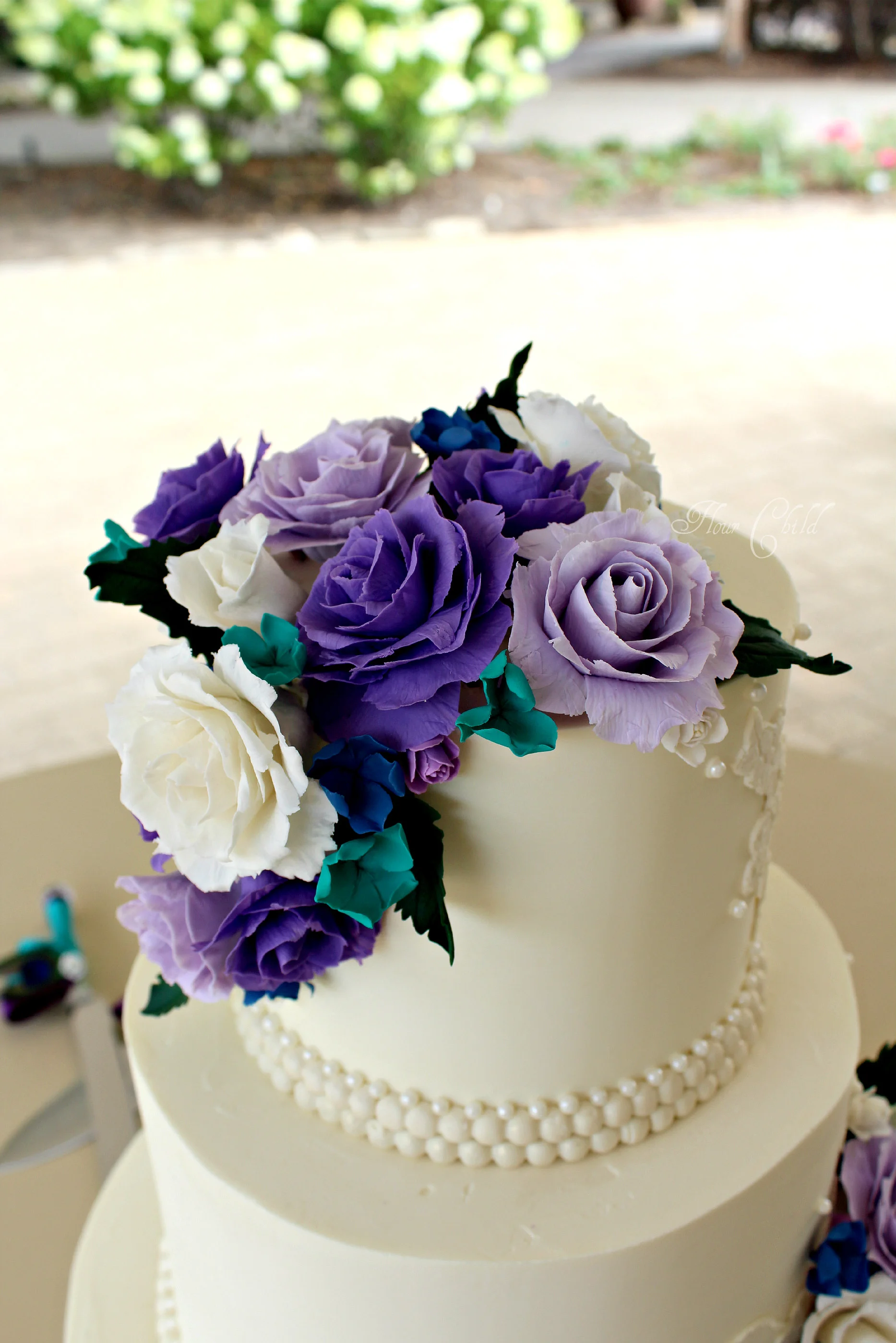 peacock colored sugar roses.jpg
