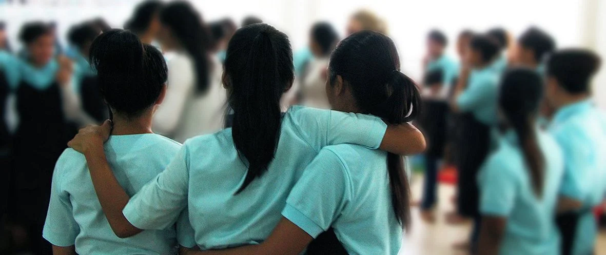three girls hugging.jpg