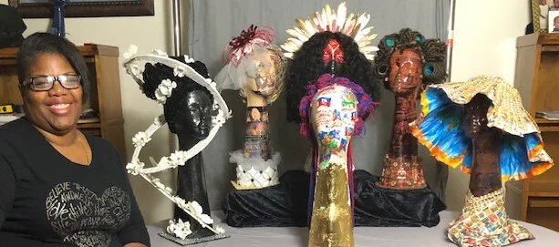Dr. Moise with the “You Don’t Look Haitian” collection.  Each representation is a facade of the historical and cultural narrative that she and many others of Haitian descent has navigated and negotiated within the Diaspora.