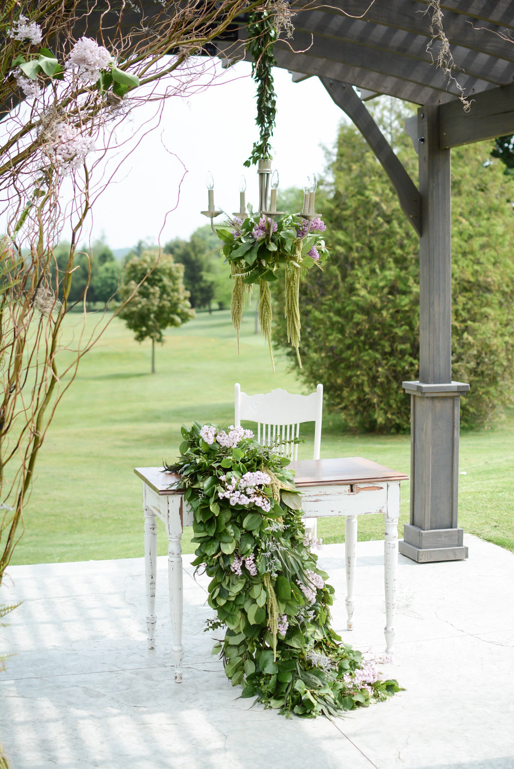 antique-signing-table-greenery.jpg