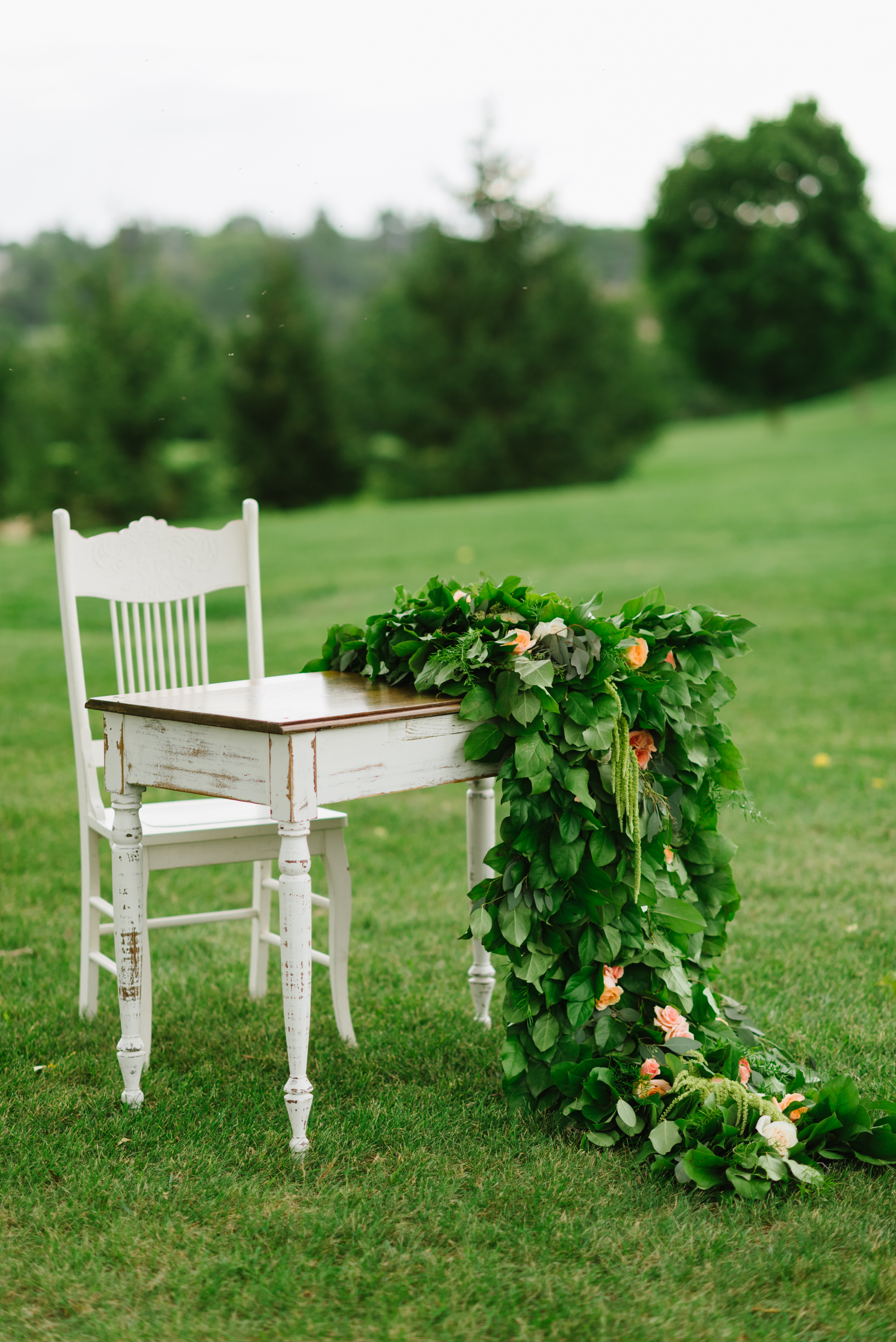 antique-signing-table-greenery-garland