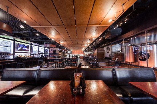 Toboggan Brewing Co. in London features an upscale pub atmosphere with a selection of craft beers brewed on site, an outdoor patio and beer and gear store. 