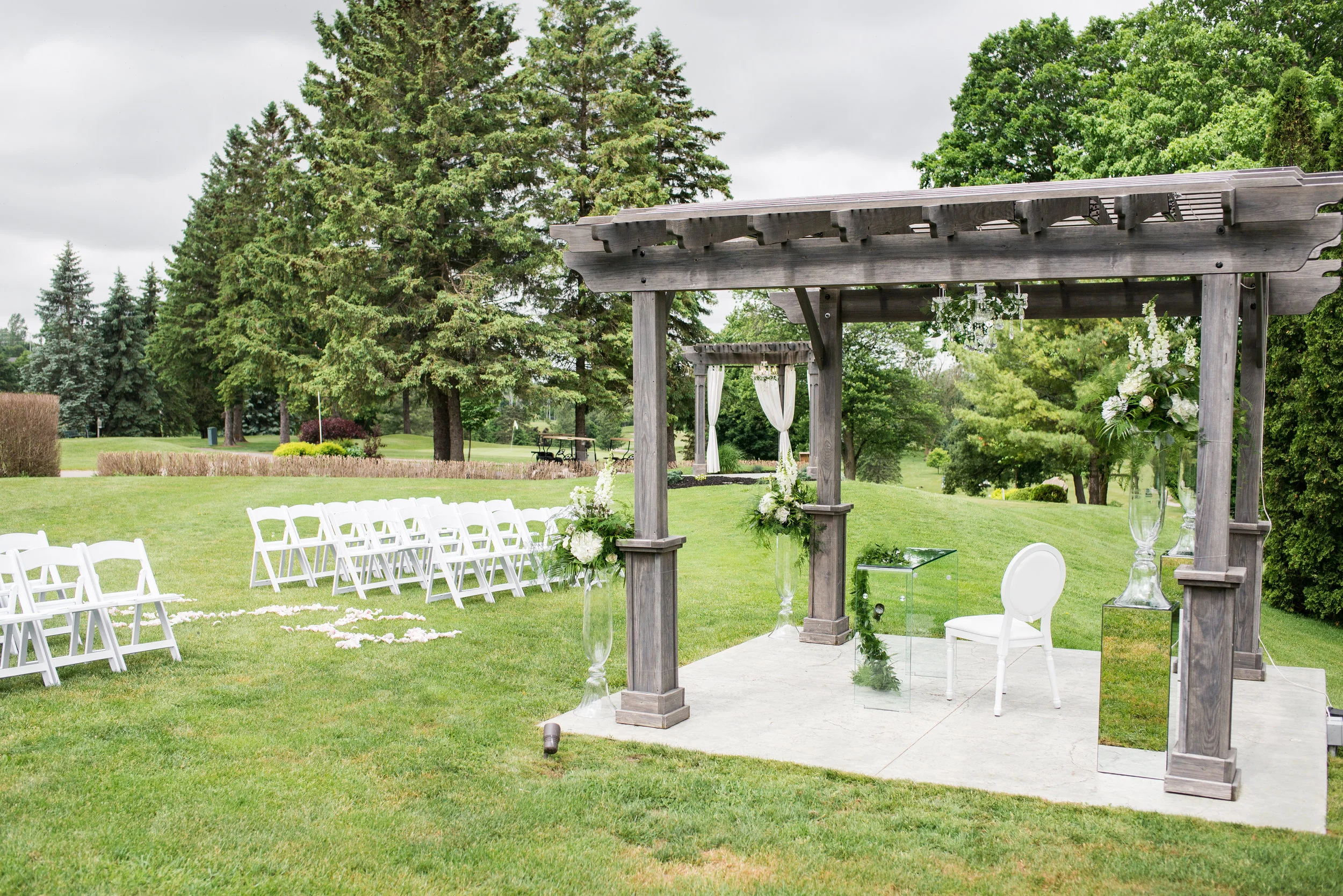 Both the ceremony and signing Ballroom pergolas were dressed with matching crystal chandeliers, courtesy of Above & Beyond Event Design.