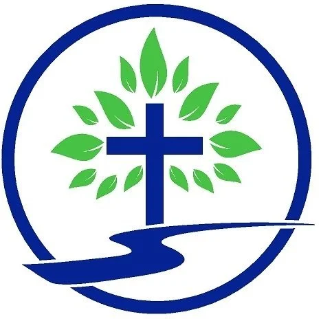 Logo featuring a blue cross surrounded by green leaves inside a blue circular border.