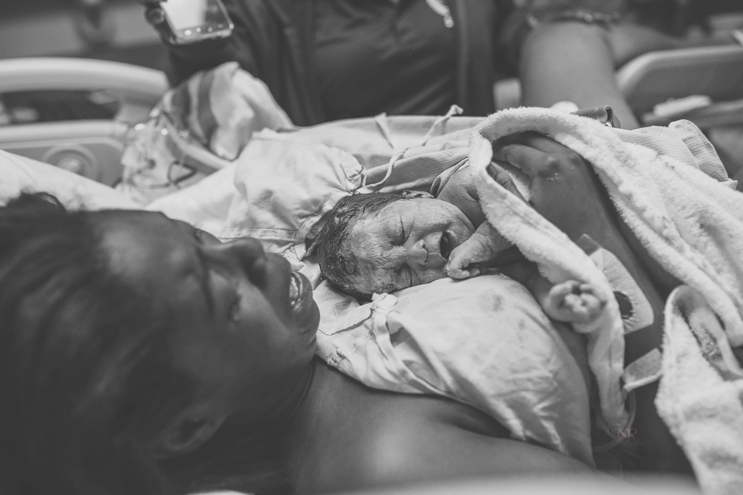 I believe this image shows the emotional side of birth. &nbsp;The love pours out of you for this new soul you hold and lay claim to.&nbsp;