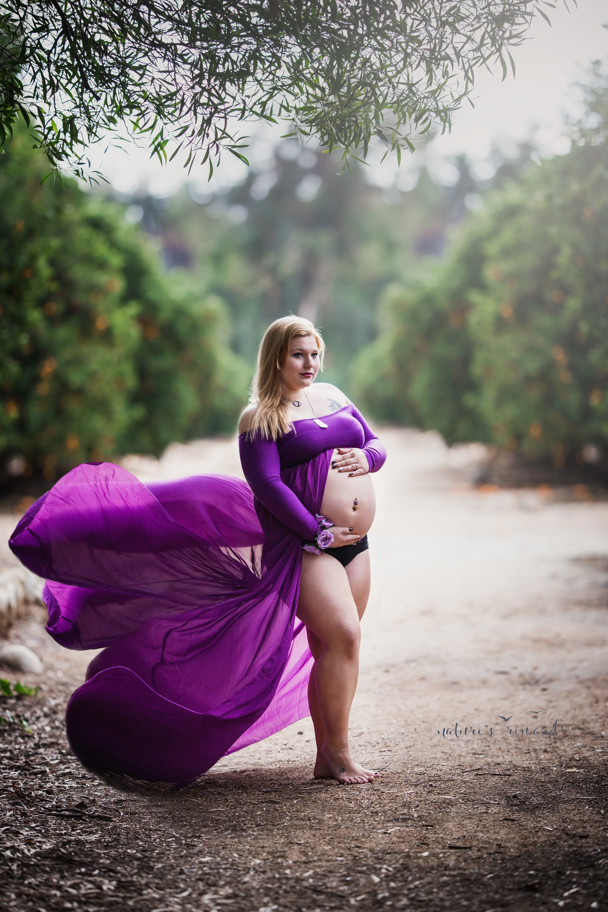 The flying maternity dress. This lovely portrait was captured in an orange grove in Redlands ca. The light and pose is gorgeous and she looks like a goddess..