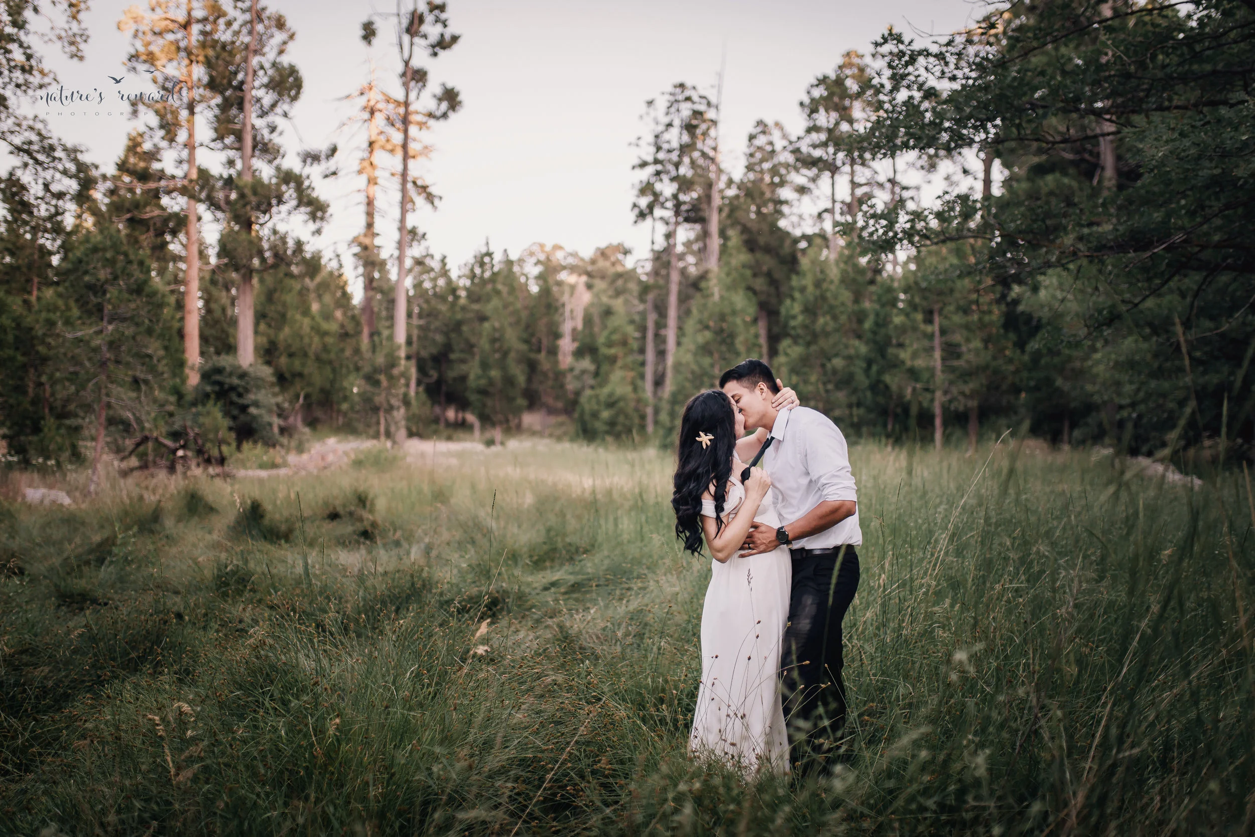 she grabbed his tie and brought him in for a kiss during this lovely bridal session