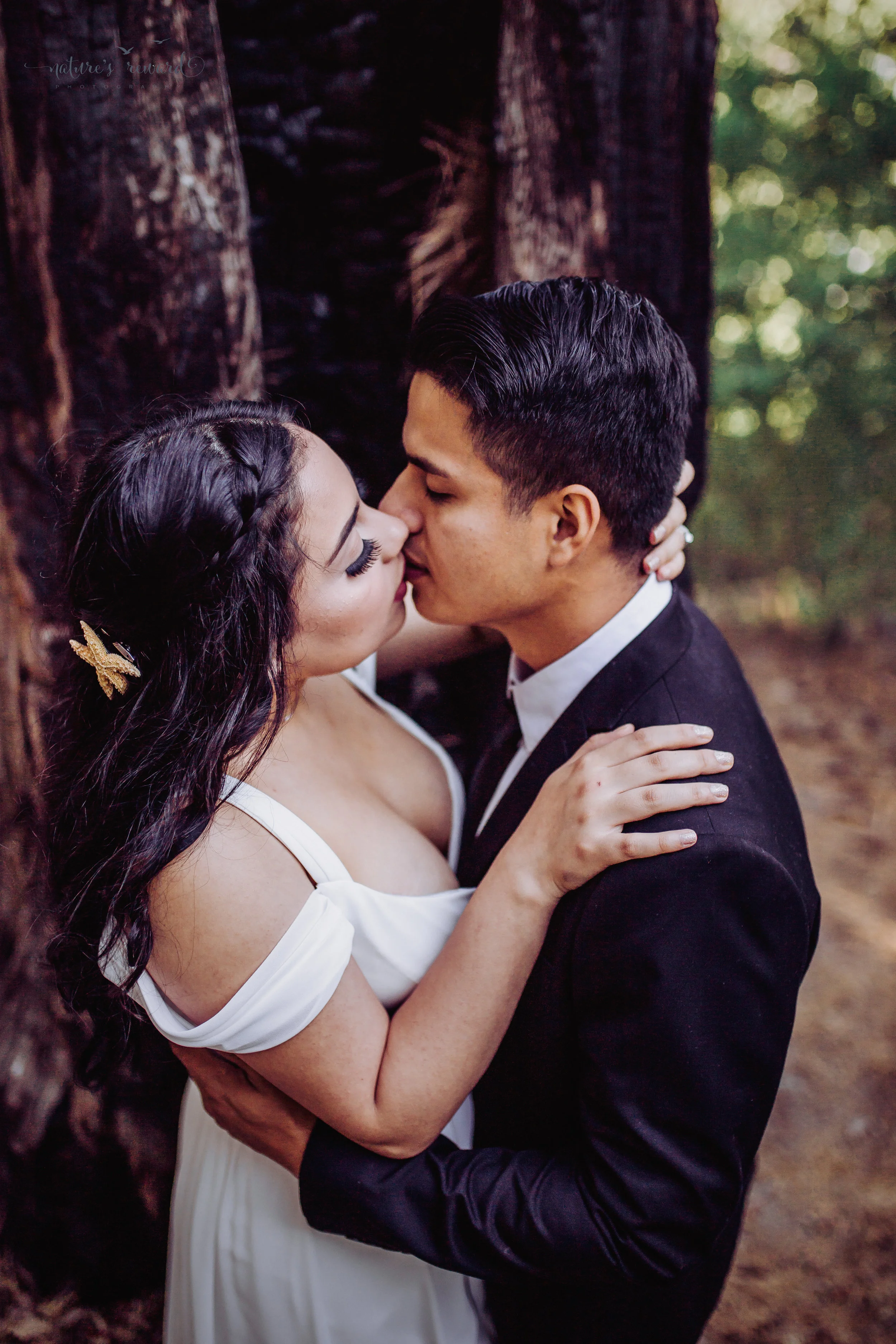 Such a hot kiss! Stunning bride and groom intimate portrait by Nature's Reward Photography