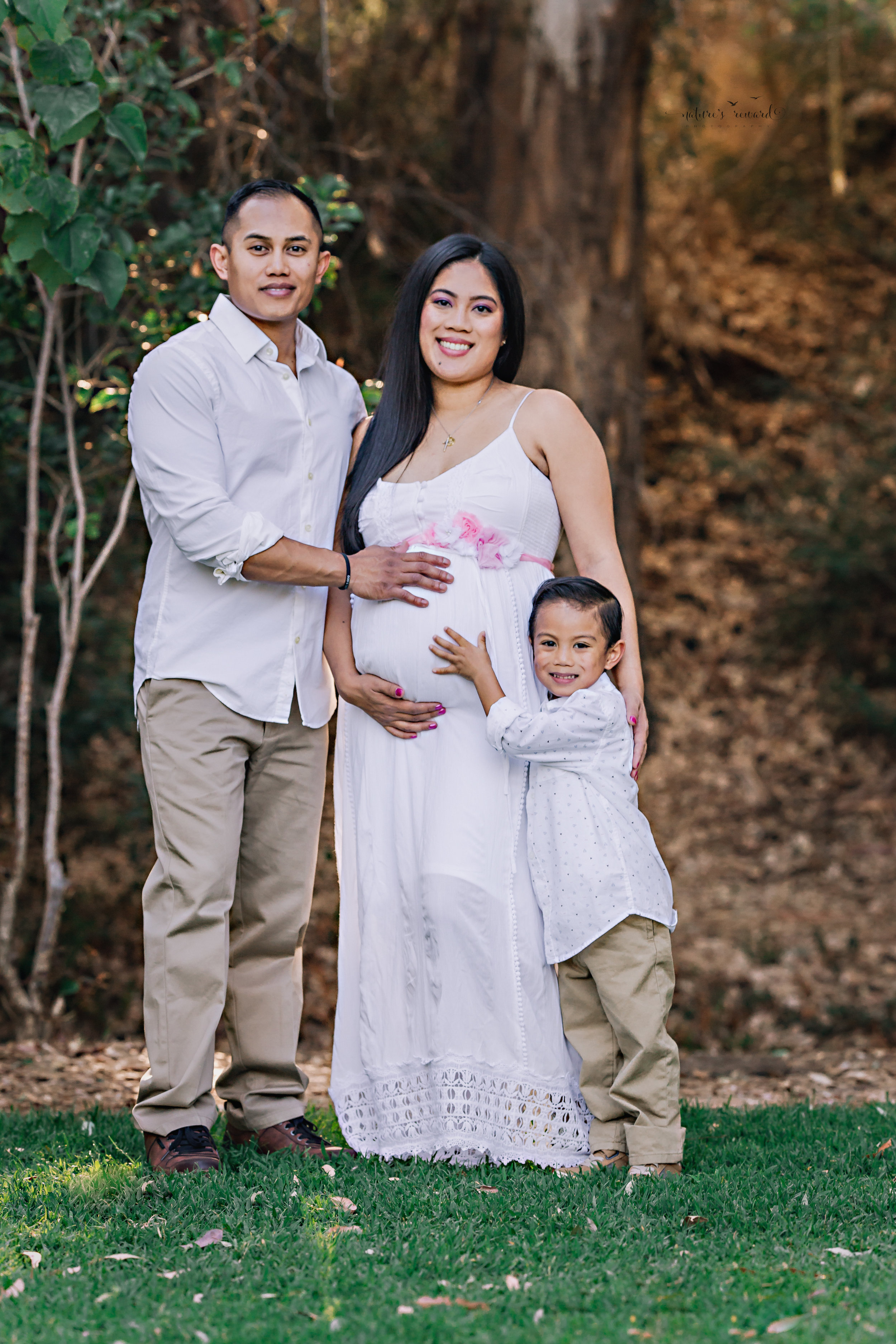 The family! Gorgeous maternity portrait by Nature’s Reward Photography