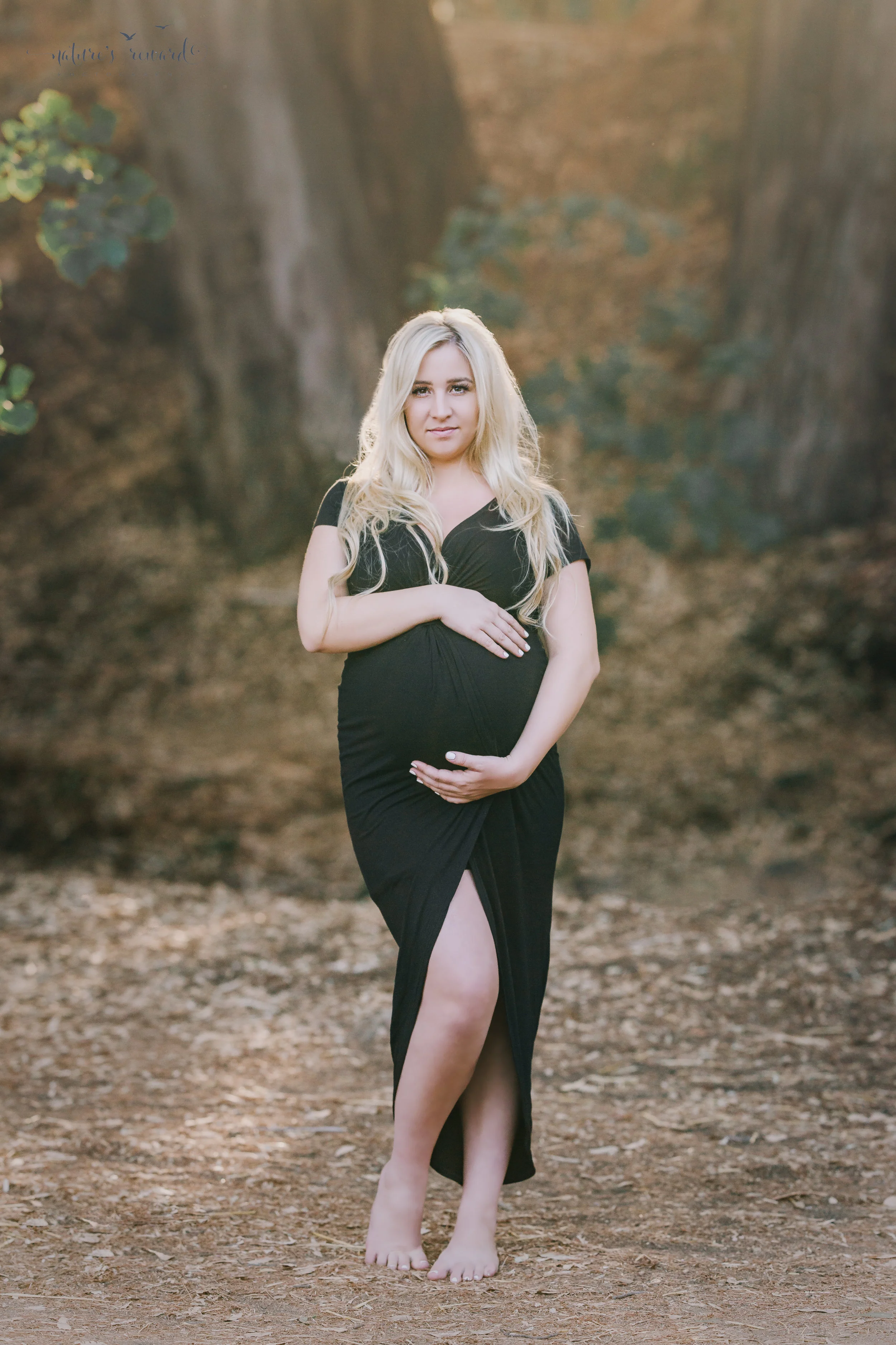 Expecting mother in black gown