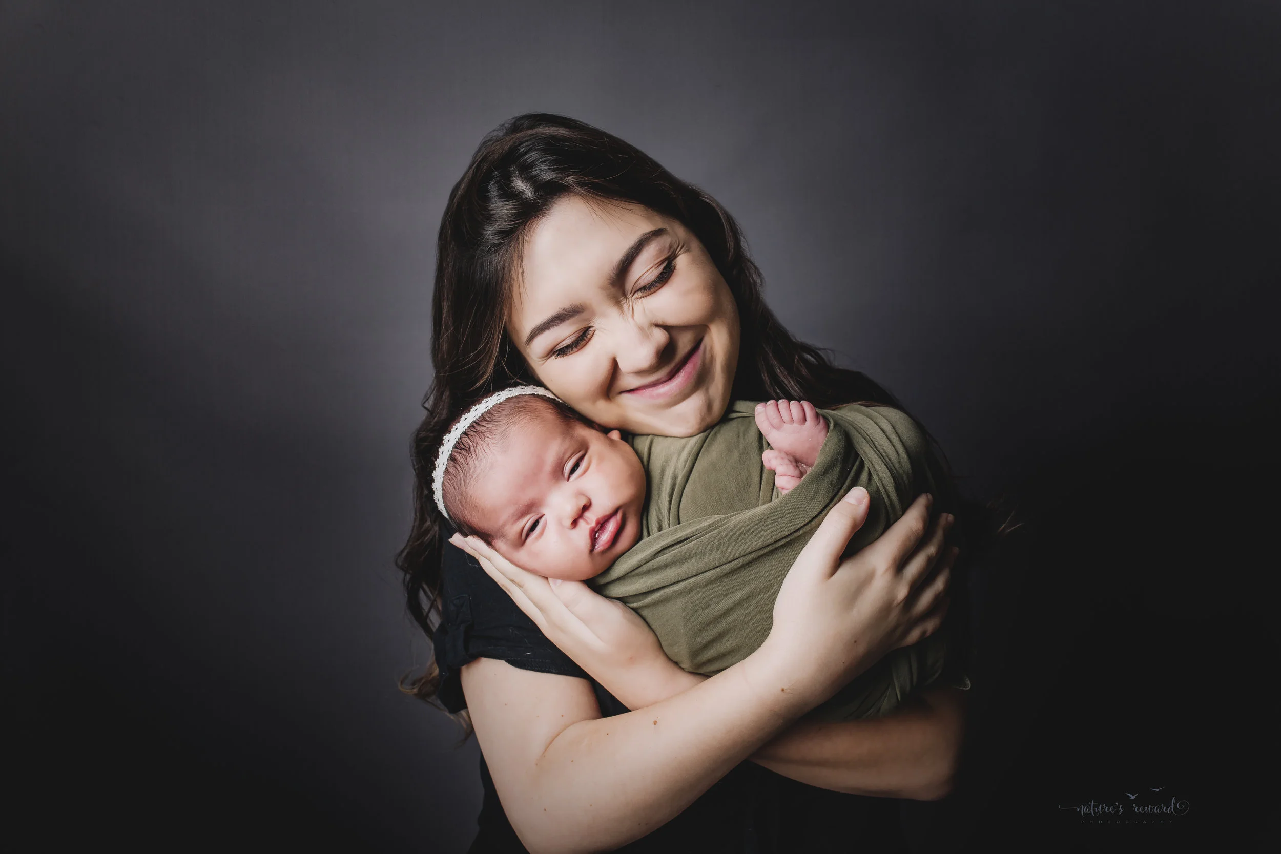 Mom and newborn baby girl portrait by Nature’s Reward Photography
