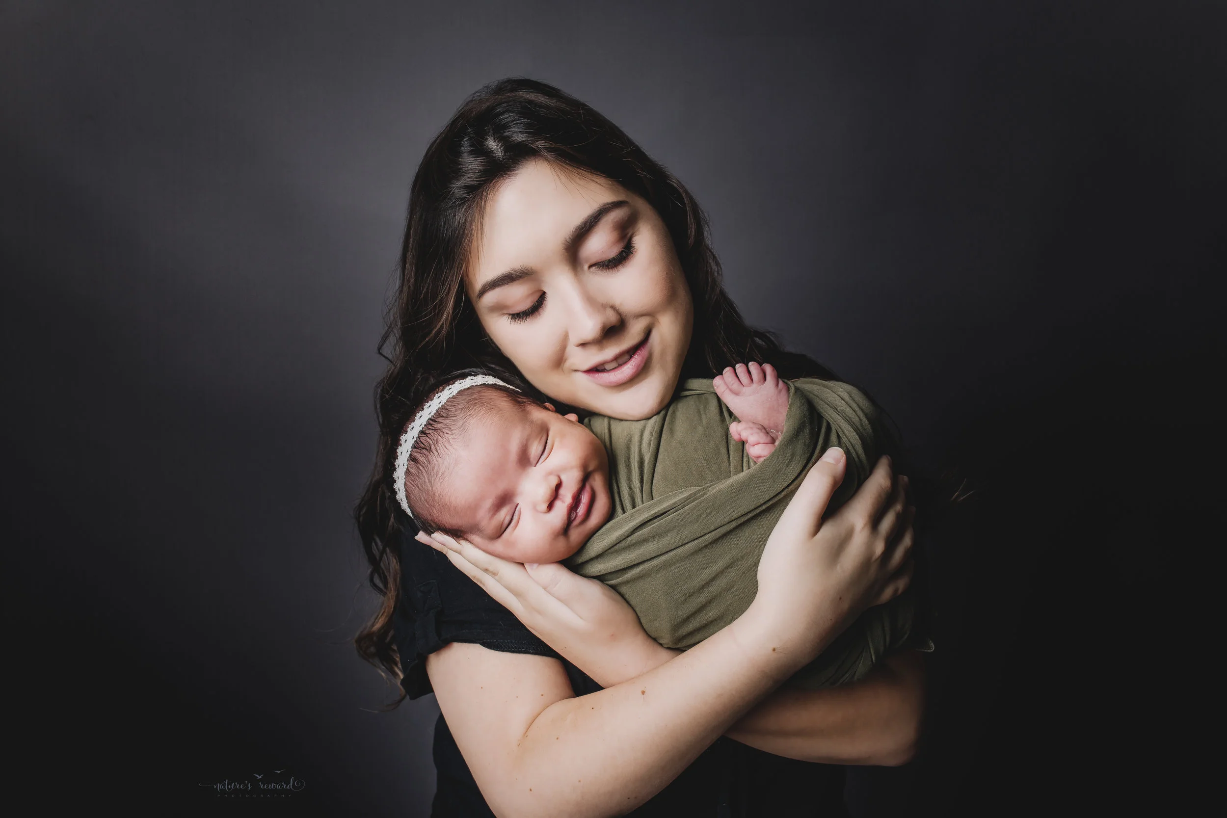 Mom and newborn baby girl portrait by Nature’s Reward Photography