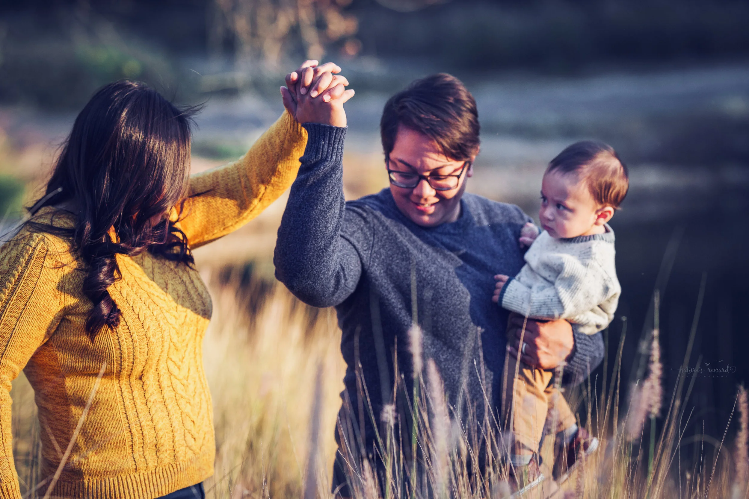 A candid family portrait by Nature’s Reward Photography