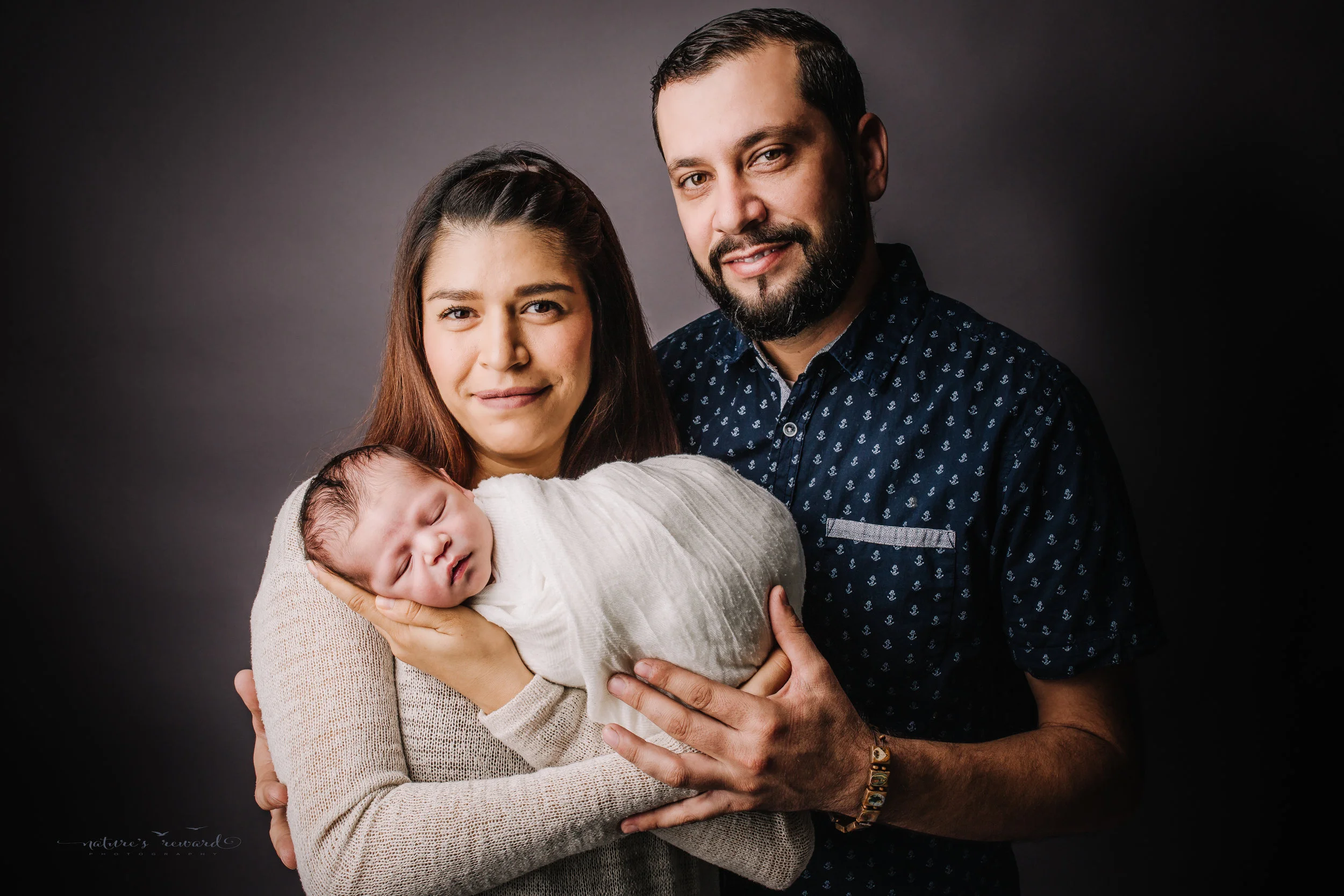 Newborn baby boy with his mom and dad by san Bernardino’s maternity, newborn and family photography, Nature’s Reward Photography