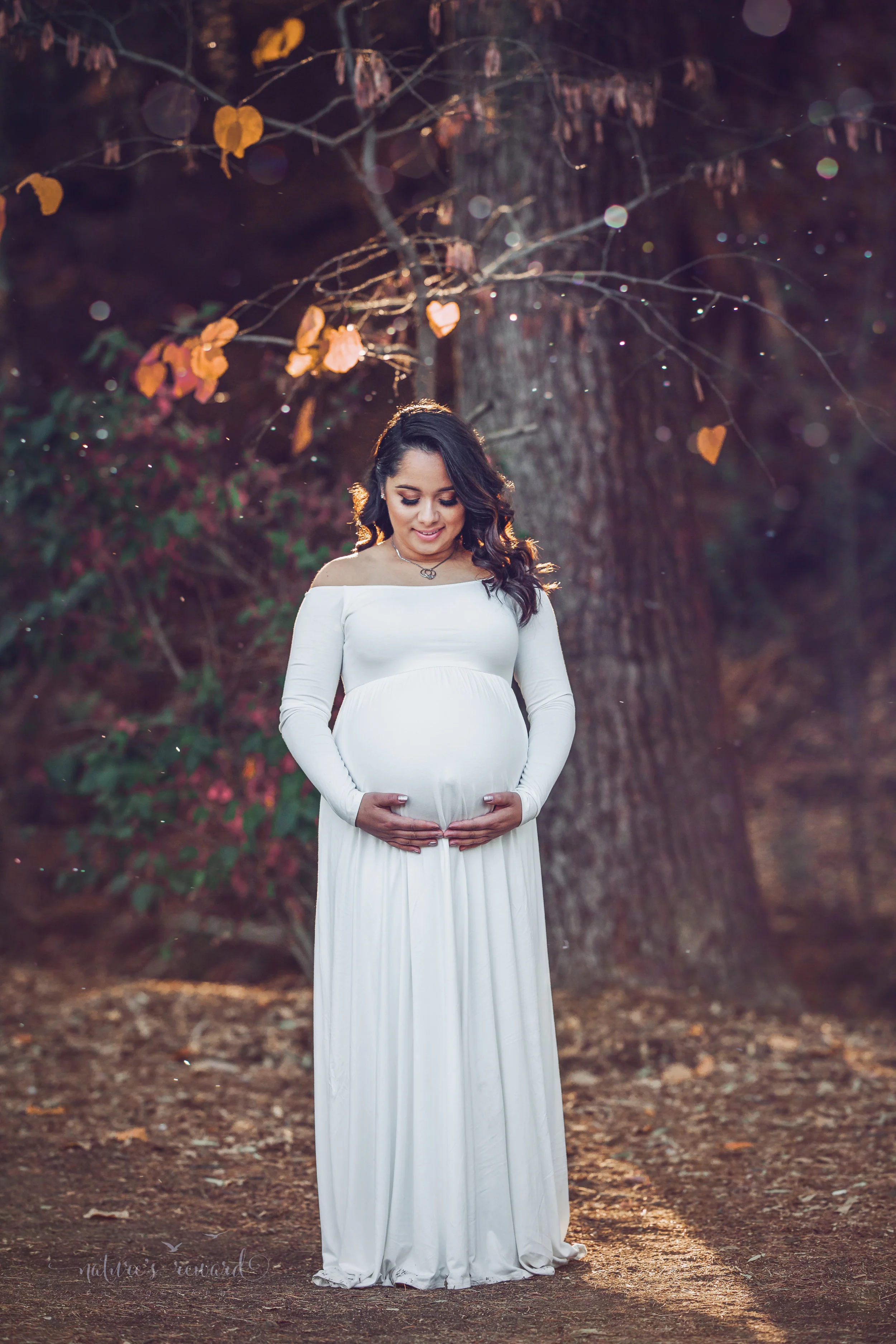 Gorgeous Maternity session in a white maternity gown in Redlands, ca park by San Bernardino photographer- Nature’s Reward Photography