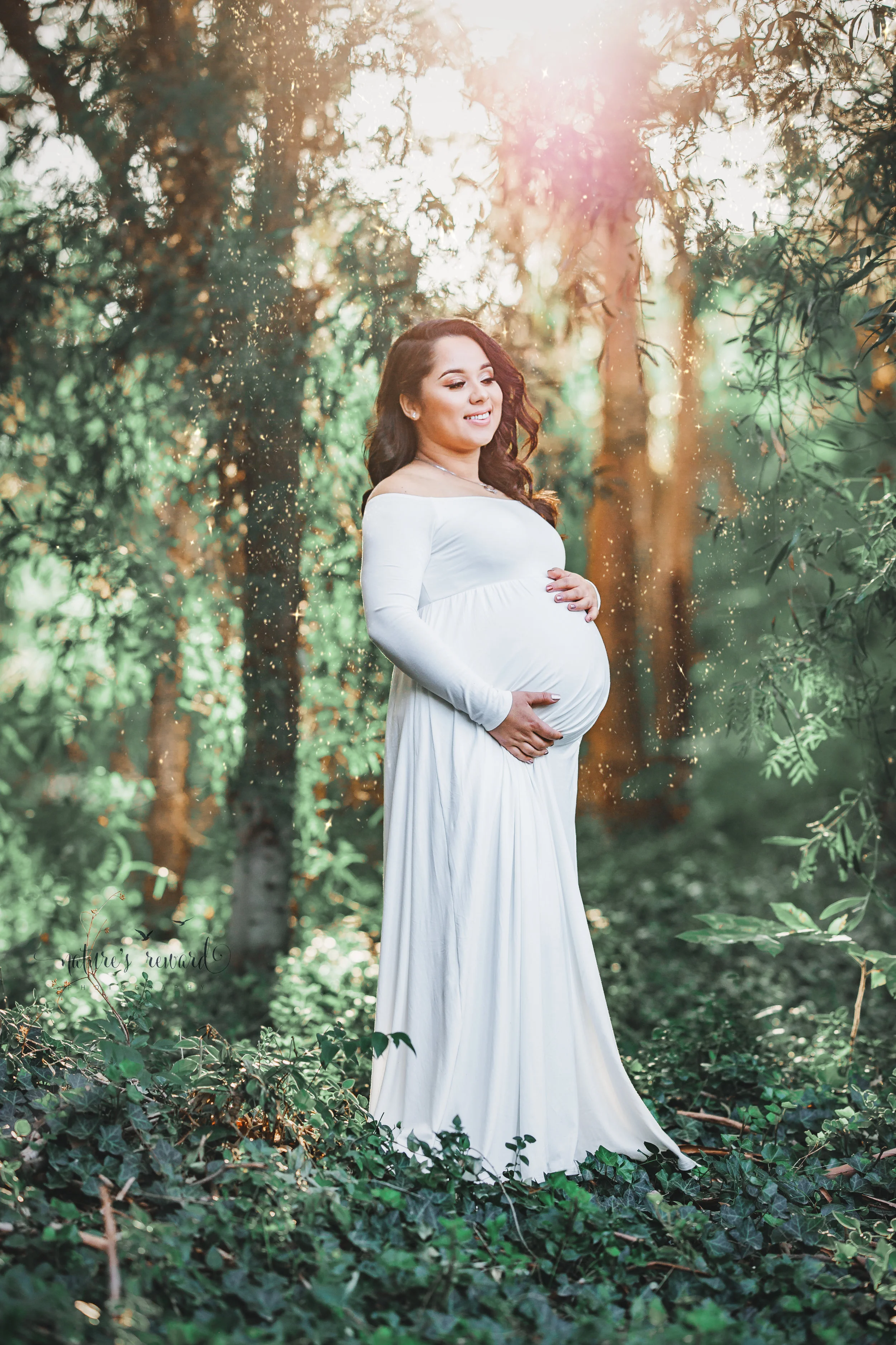 Gorgeous Maternity session in a white maternity gown in Redlands, ca park by San Bernardino photographer- Nature’s Reward Photography