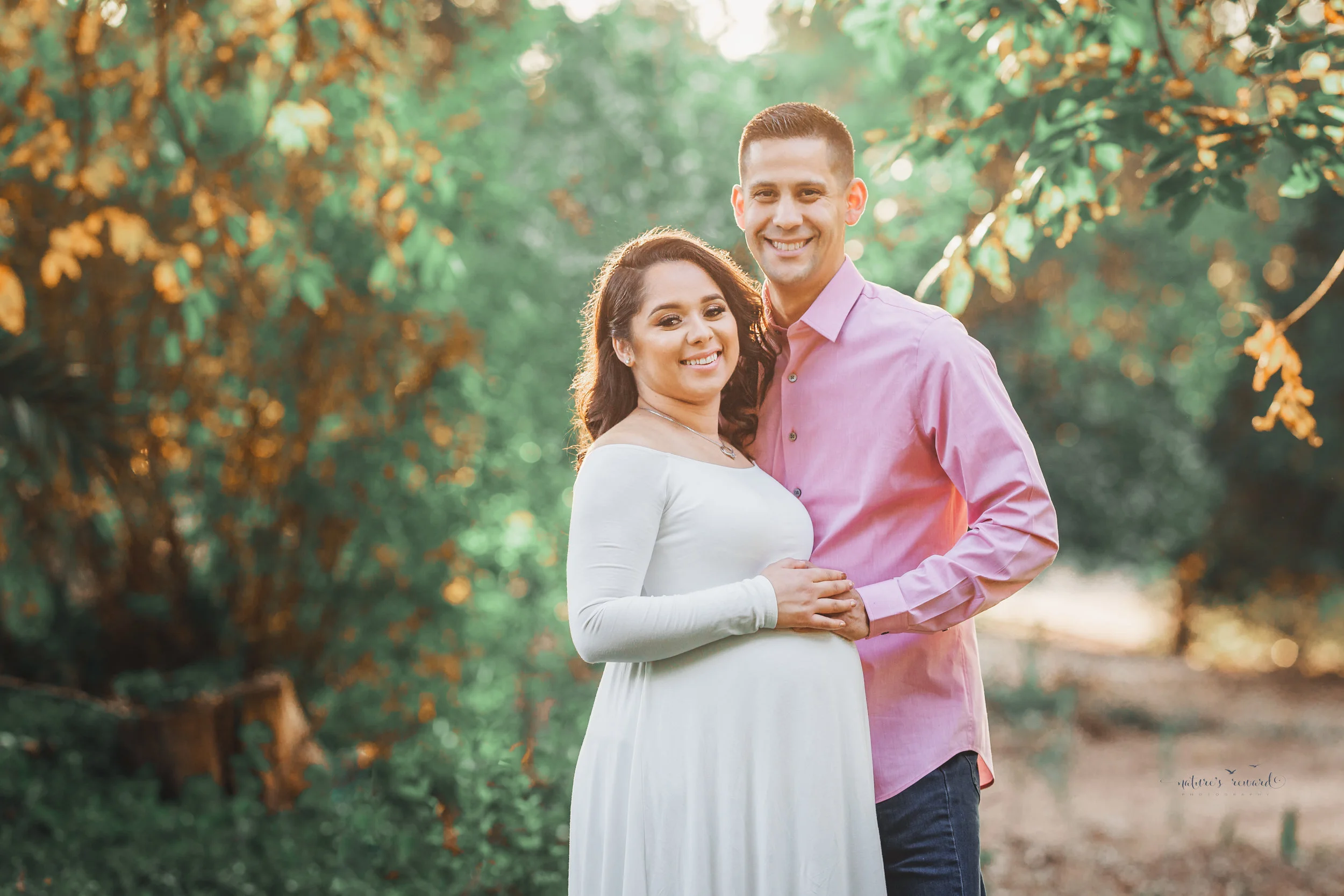 Gorgeous Maternity session in a white maternity gown in Redlands, ca park by San Bernardino photographer- Nature’s Reward Photography