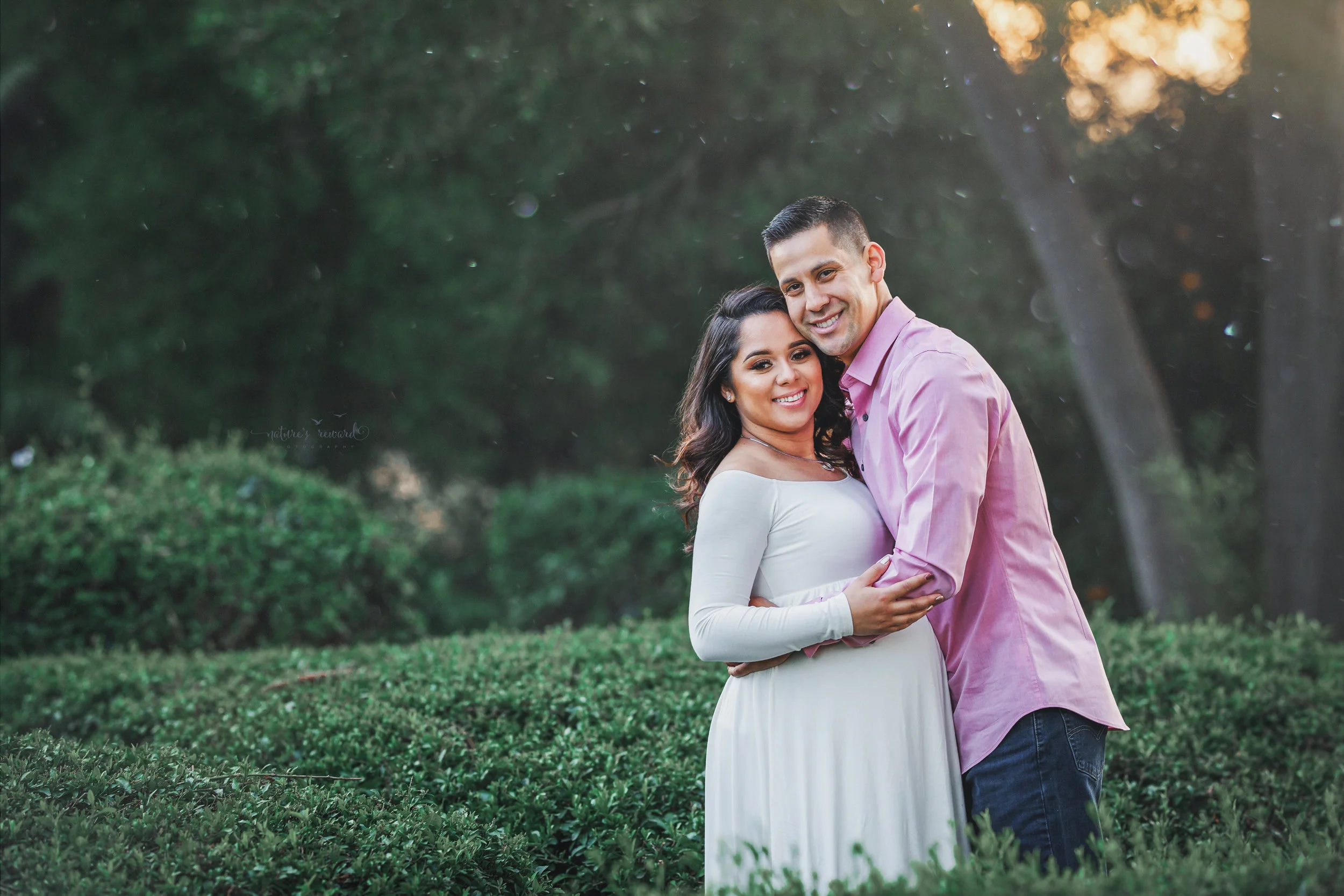 Gorgeous Maternity session in a white maternity gown in Redlands, ca park by San Bernardino photographer- Nature’s Reward Photography
