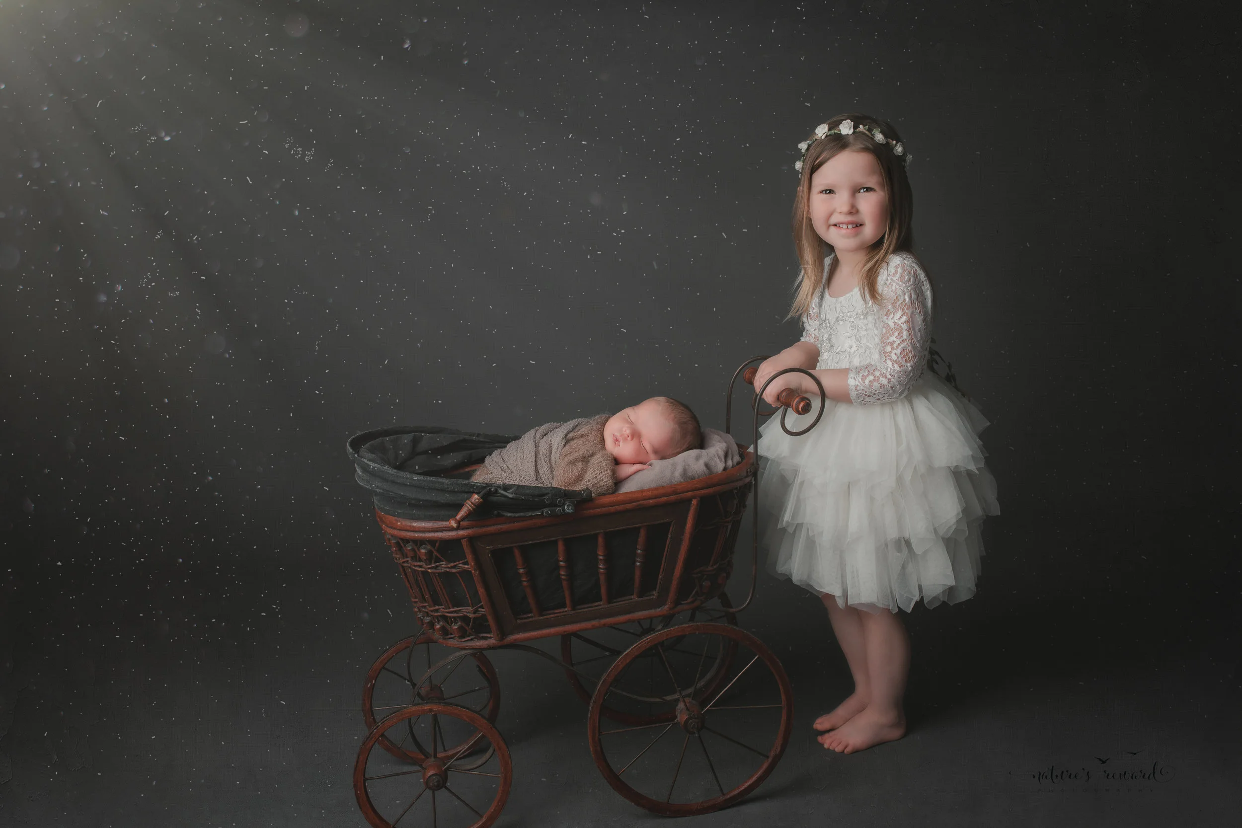 Newborn Baby boy and his big sister, a portrait by Nature’s Reward Photography