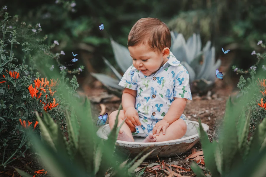 6 month old baby boy in his sitter session in a beautiful park, a portrait by Nature’s Reward Photography