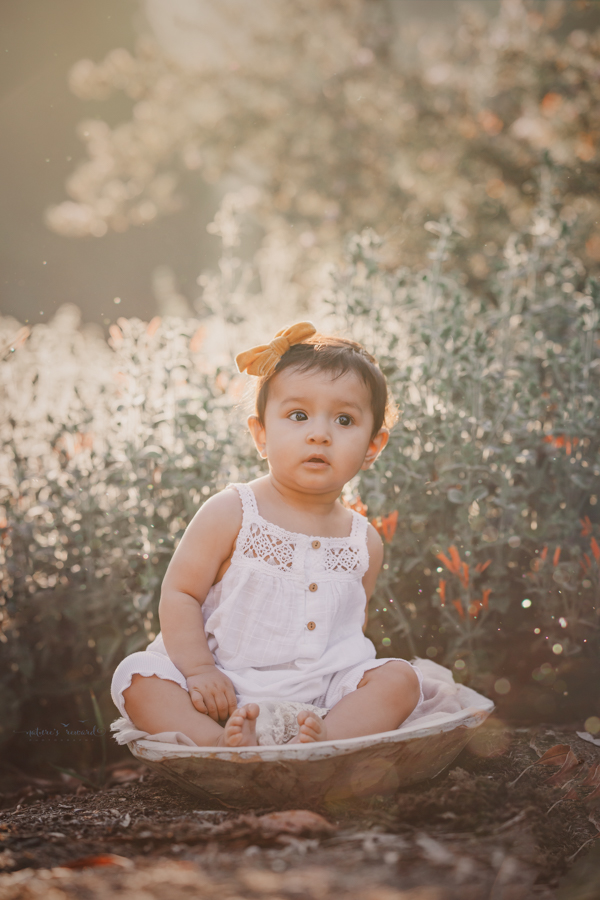 Baby Girl Portrait during a family session by Nature’s Reward Photography
