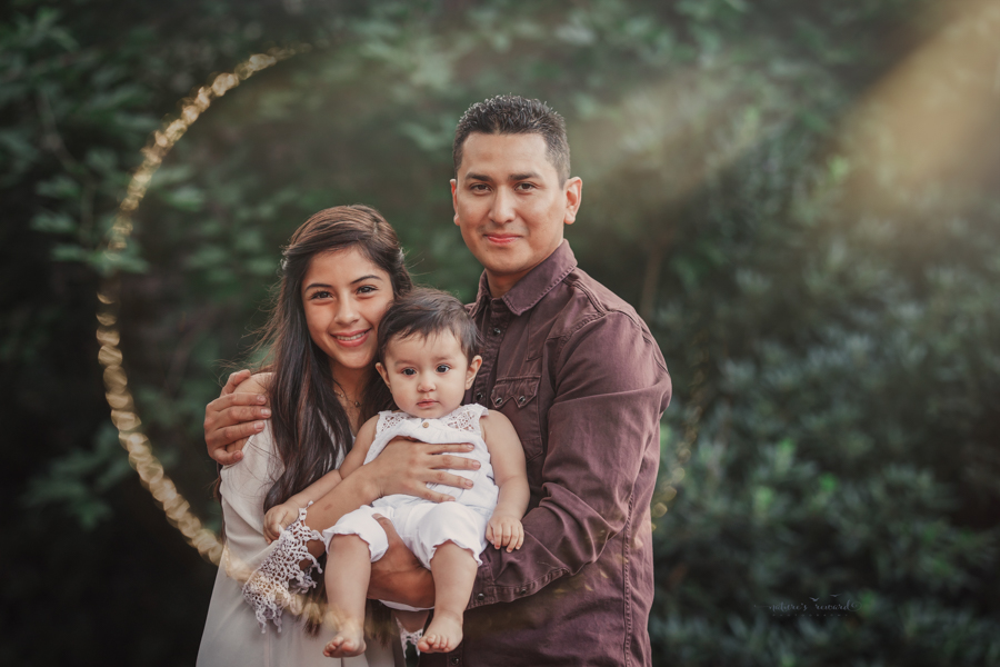 Dad and daughters portrait taken during a family session by Nature’s Reward Photography