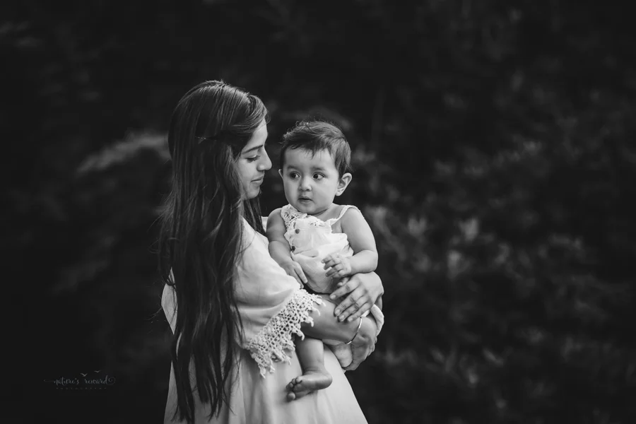 Black and white Sibling Portrait taken during a family session by Nature’s Reward Photography