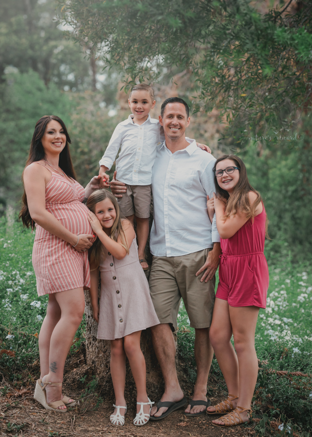 Beautiful family expecting a baby in this Maternity portrait by Nature’s Reward Photography