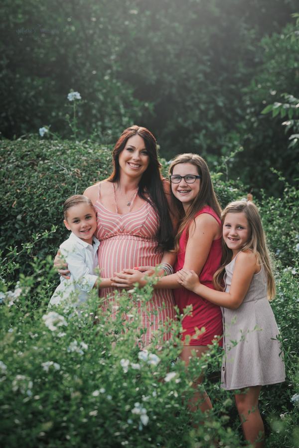 Beautiful family expecting a baby in this Maternity portrait by Nature’s Reward Photography