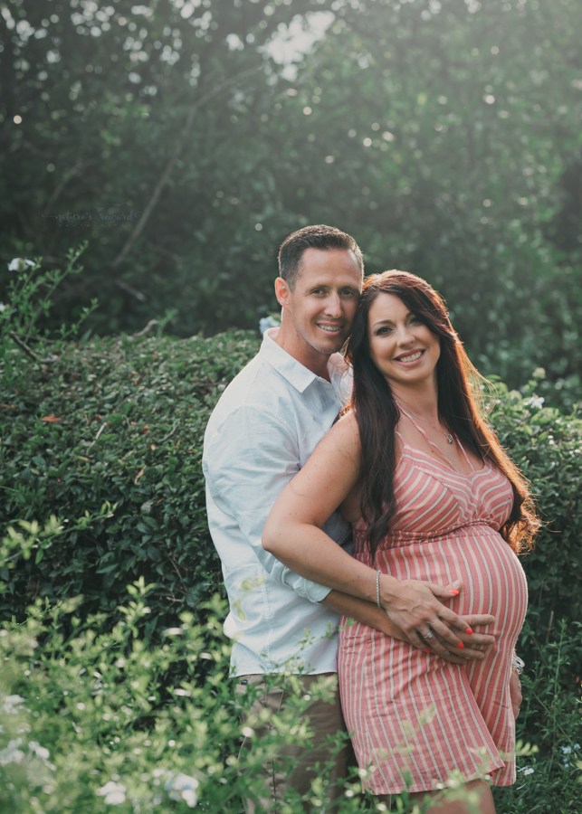 Loving couple expecting a baby in this maternity portrait by Nature’s Reward Photography