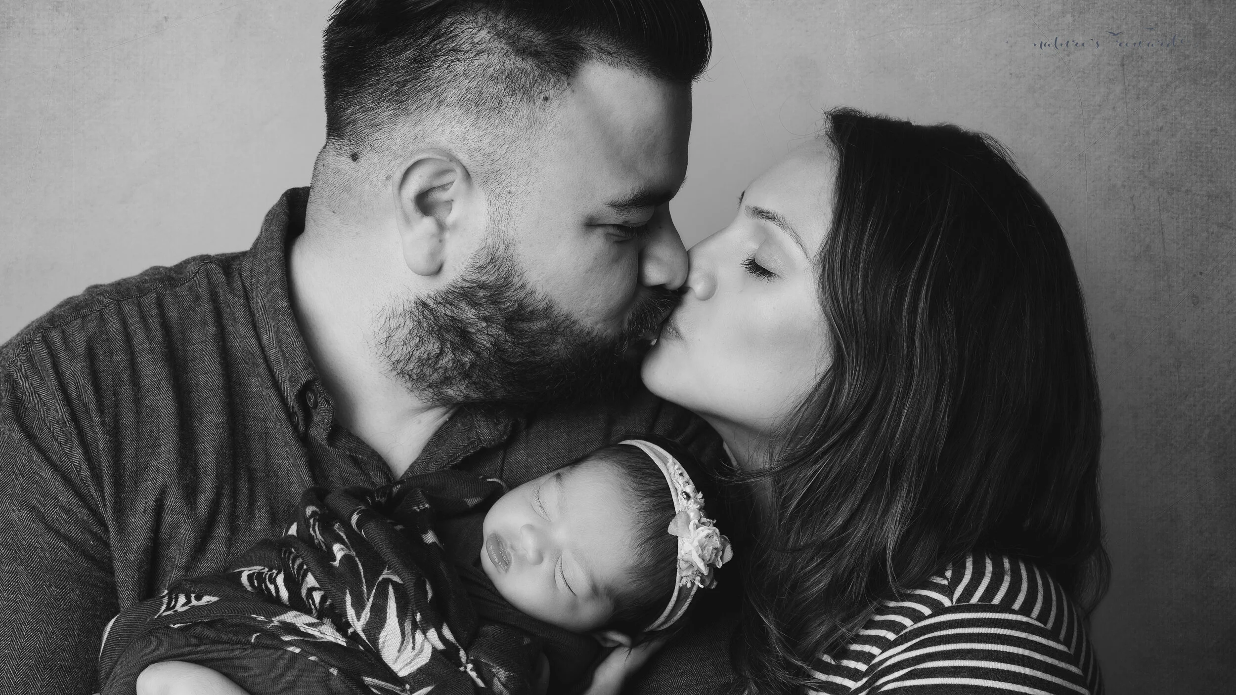 Family portrait, a newborn portrait by Nature’s Reward Photography