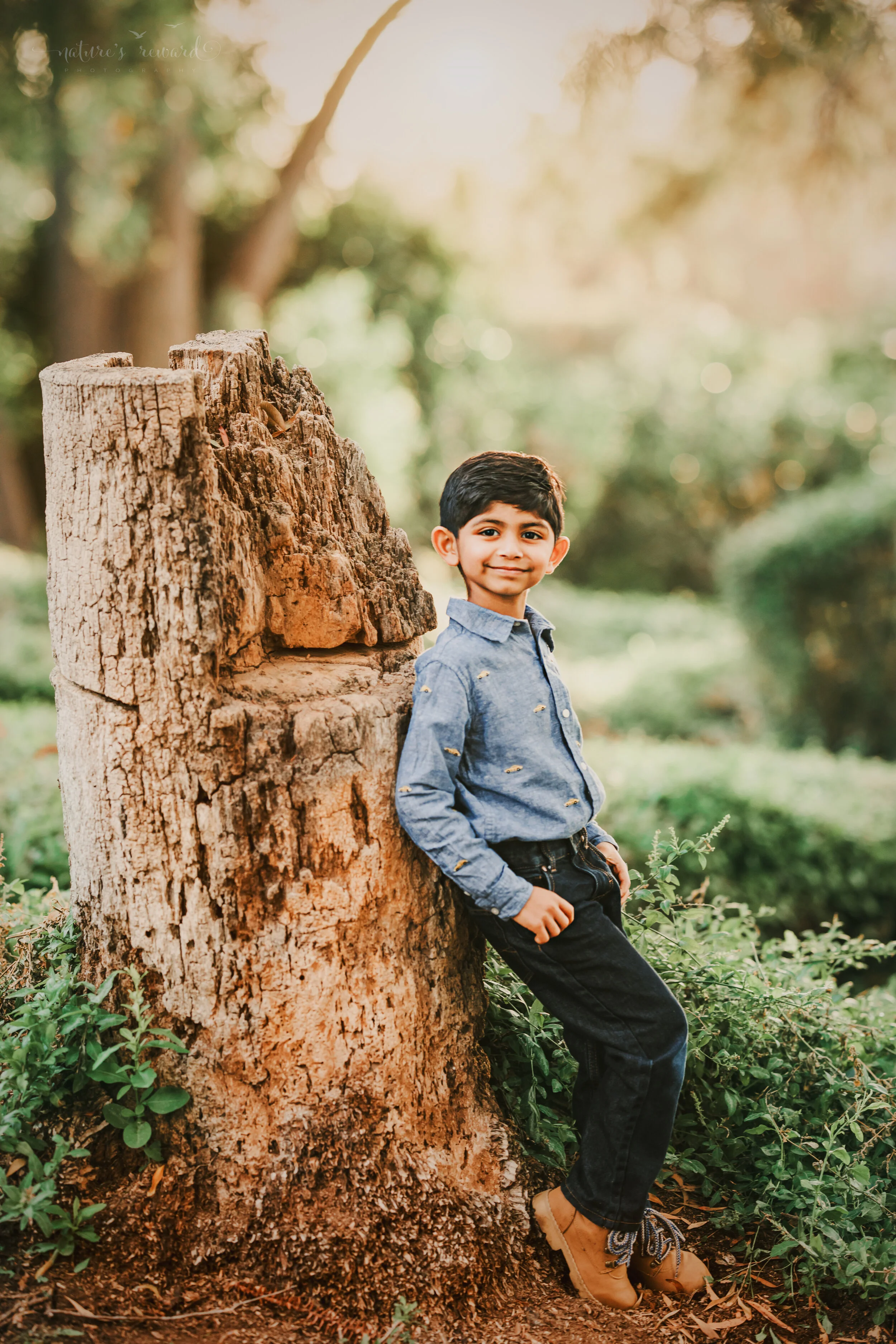 Fall child’s portrait in a lush green park in redlands California, by San Bernardino photographer, Nature’s Reward Photography.