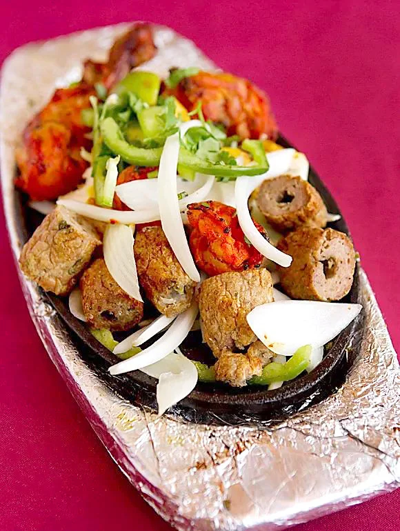   Persis Biryani  (Image: Tandoor platter)  Nothing says “date night” like spicing things up a bit. Persis Biryani is a great spot for you and your boo to sit down and enjoy a nice meal together. Persis has crafted a menu that is comprised of some of