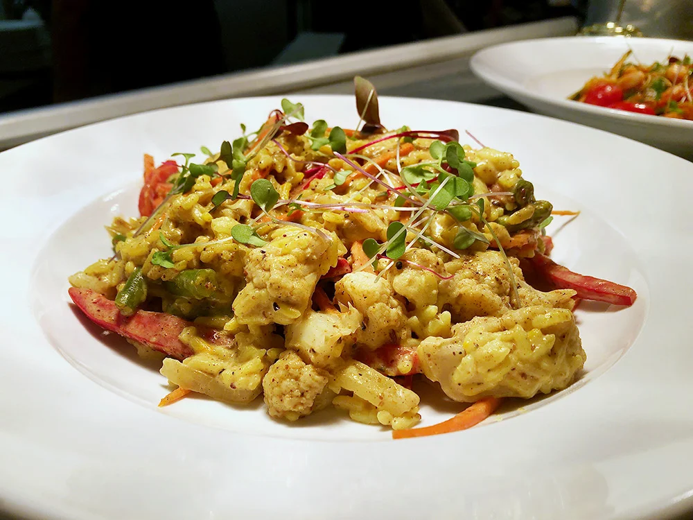  con’t The Farehouse  (Image: VV curry)  For the vegetarian, try their zucchini pasta, eggplant parmesan, Print Works veggie pizza, or kale salad. Their vegetable curry is vegan, made with house made spices. They also offer rotating craft cocktails a