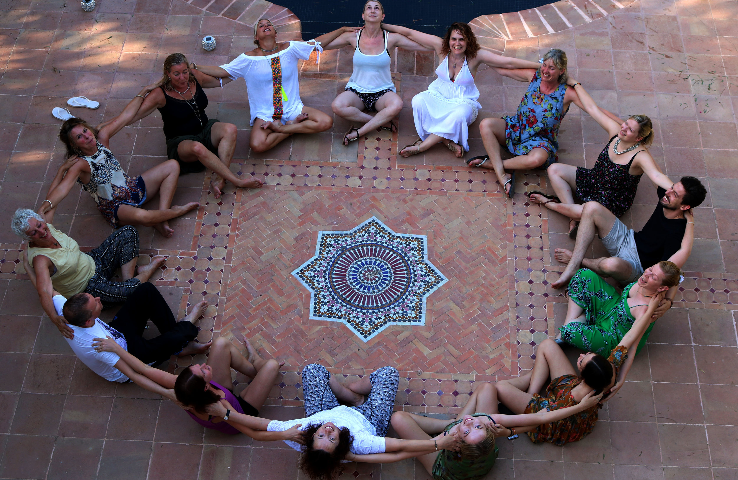 outdoor circle yoga retreat.jpg