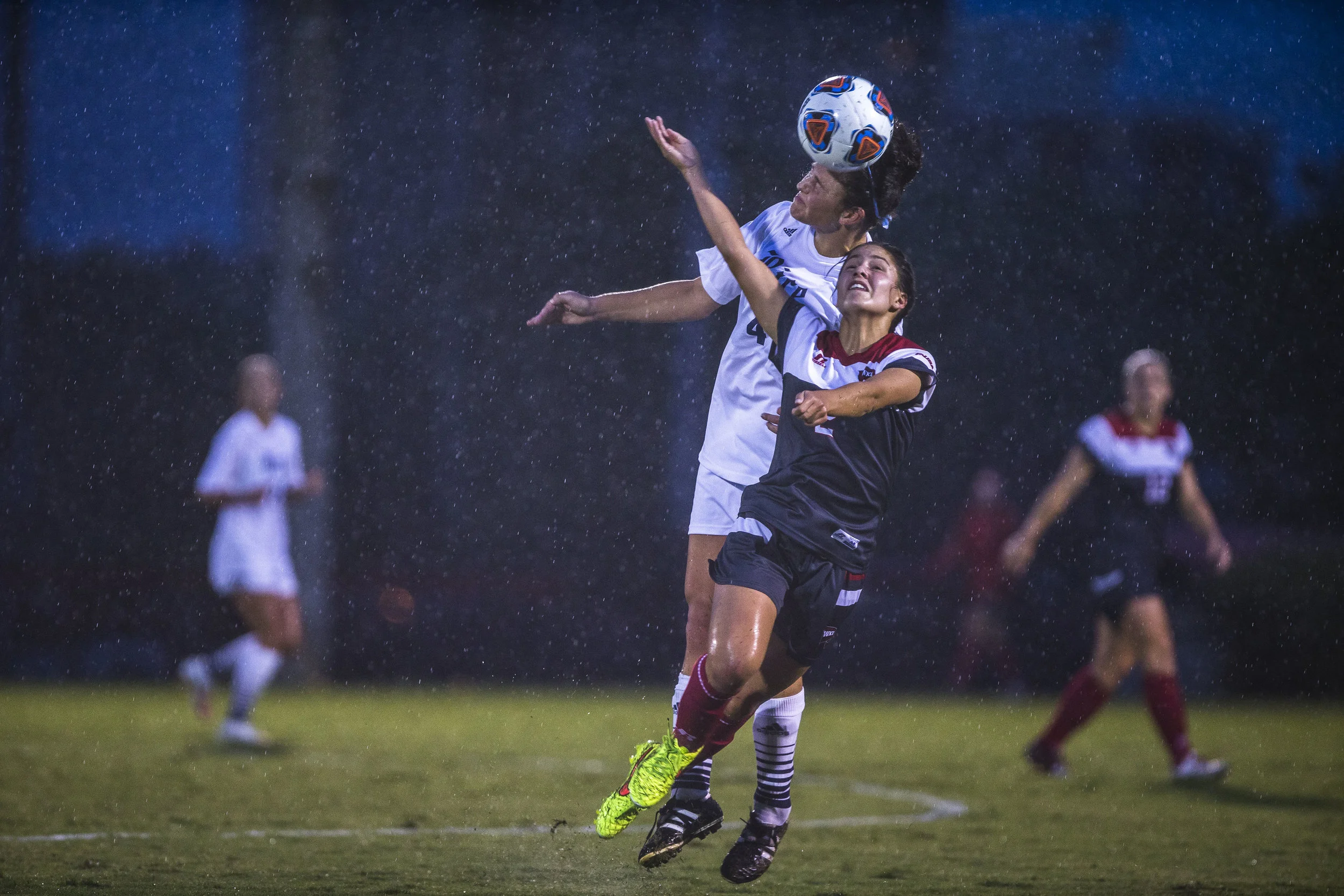  Rice University's Samantha Chaiken heads the ball as WKU's Hannah Chua competes for control to bring it into play. WKU's Women's soccer team fell short to Rice University in a 3-1 match on Friday Sept. 25 at WKU's soccer complex. 