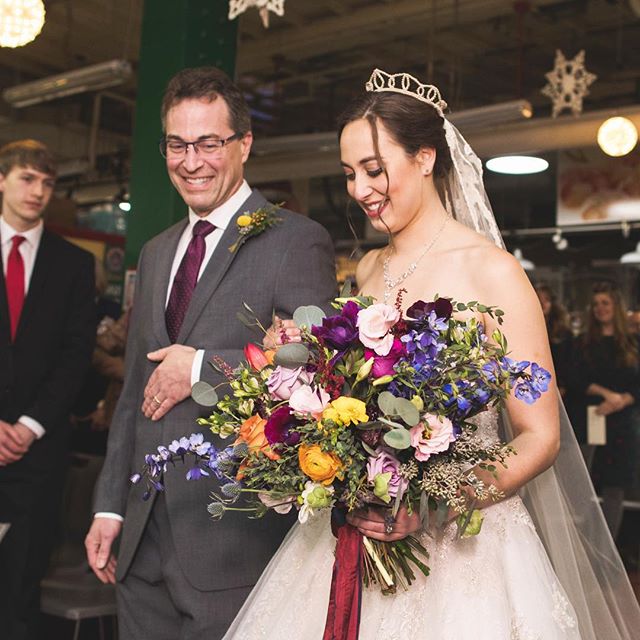 Stephanie and Rob&rsquo;s wedding was at the ReadingTerminal Market and it was such a festive and fun atmosphere! I love this shot of Steph and her dad❤️ She was stunning!  Photo credits: @shannoncollinsphoto  #phillybride #weddingflowers #bridalbouq