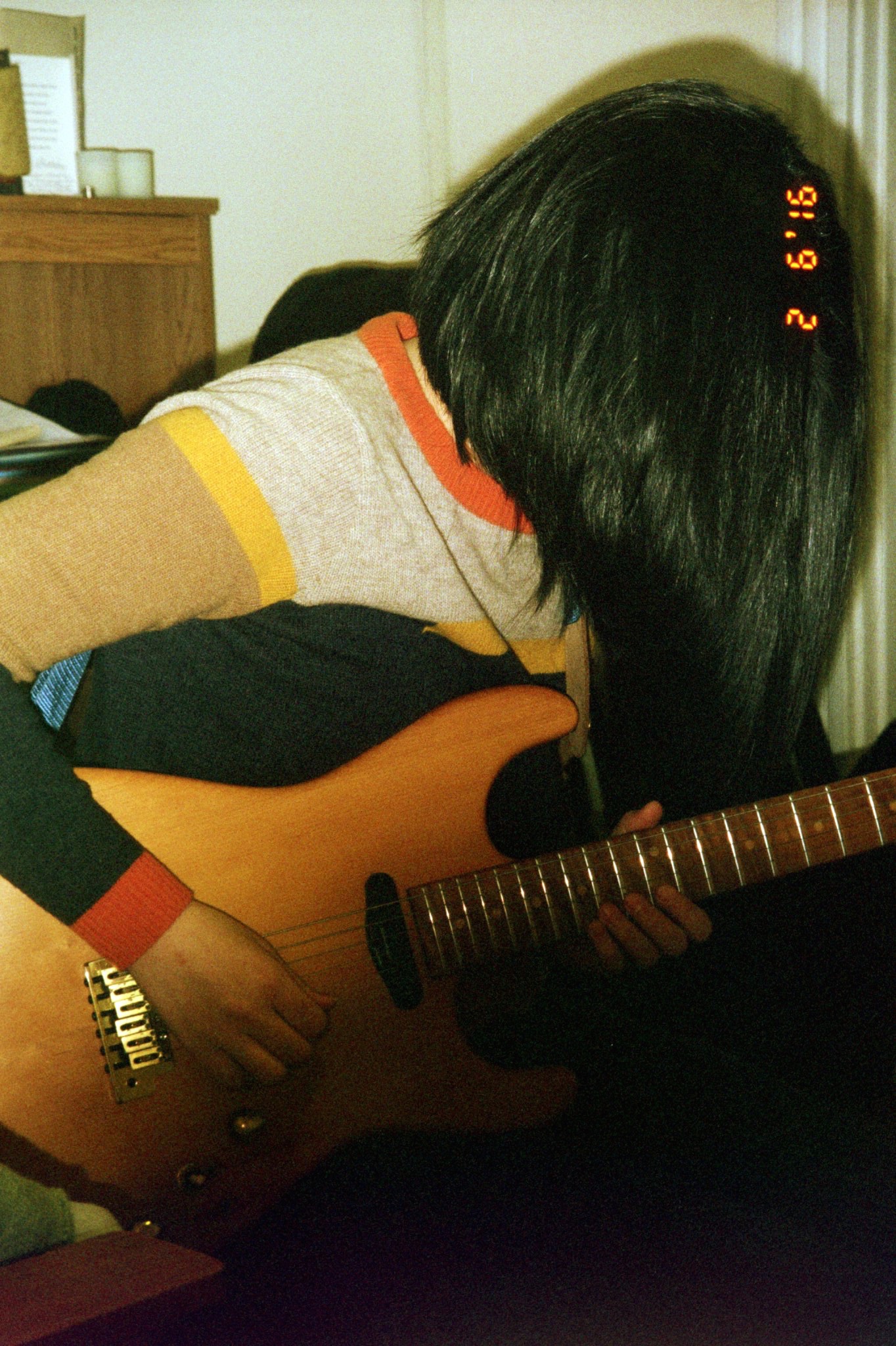 Eunsea Min recording electric guitar on "Party Dress".
