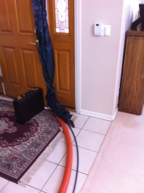  Here is our weather guard used to keep out the cold (or hot) air while our hoses are in use. 