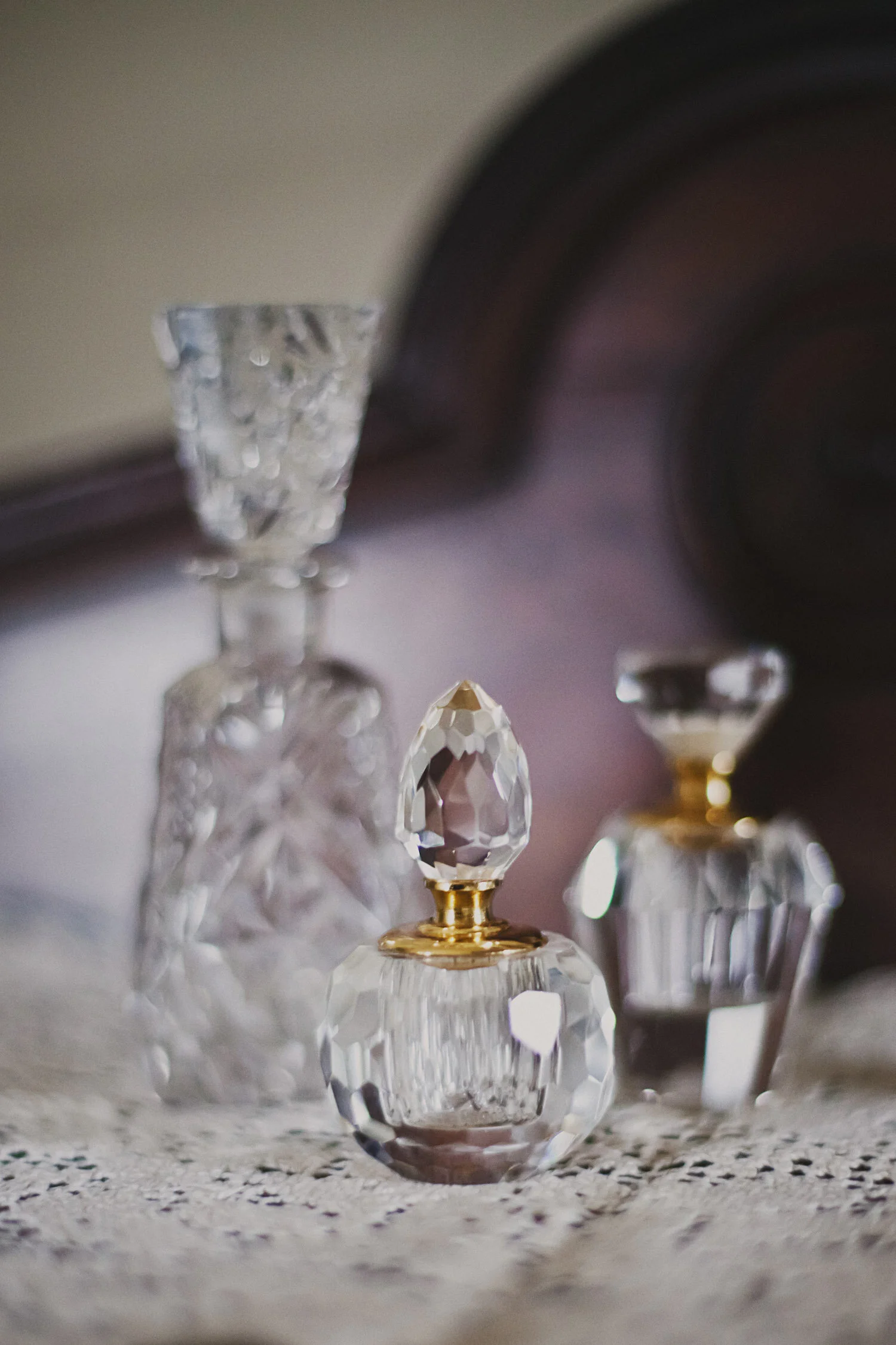  detail shot of vintage crystal perfume bottles.  