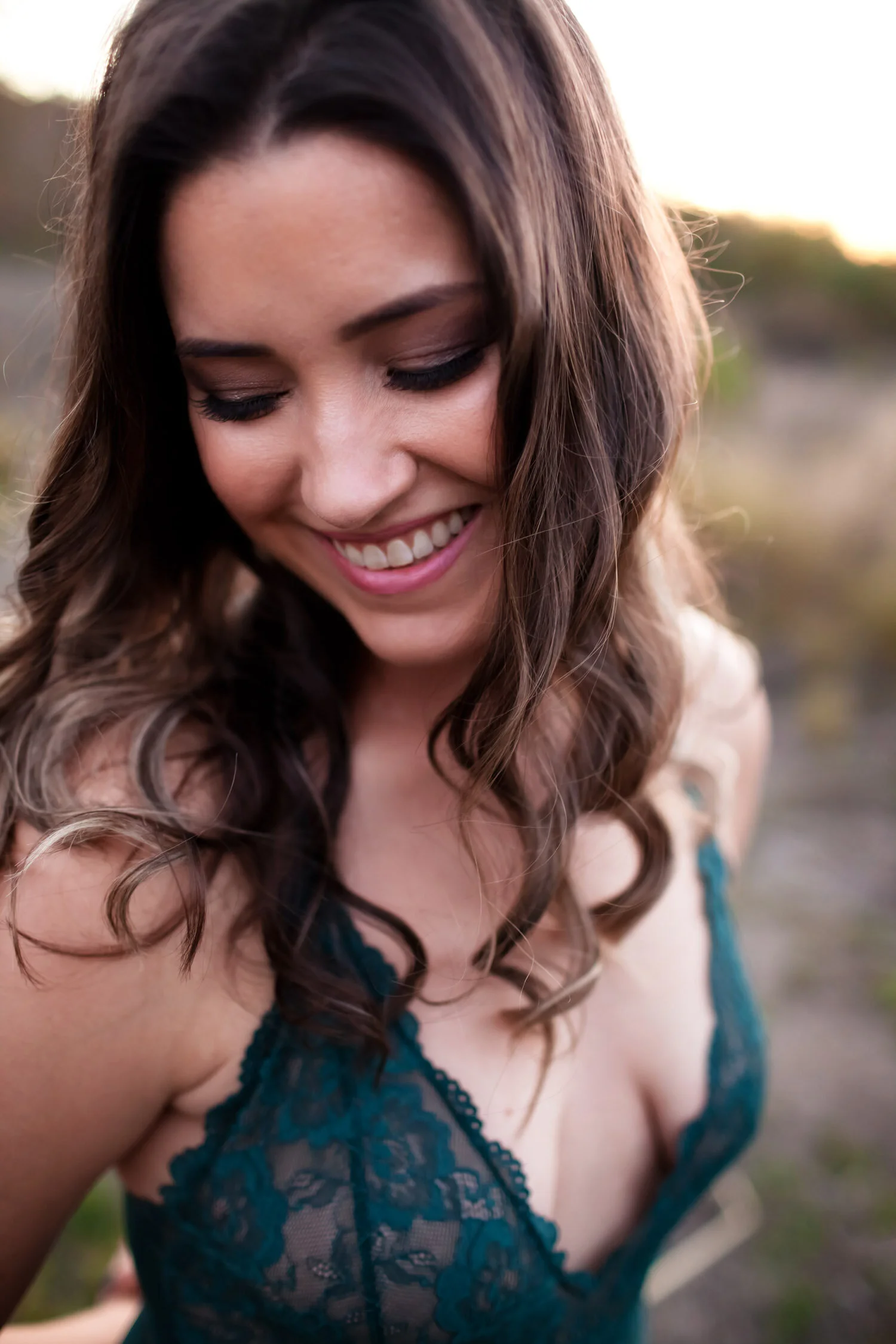  Outdoor boudoir in a field. Empowerment boudoir for diabetic with insulin pump. Teal lace teddy and moody editing.  