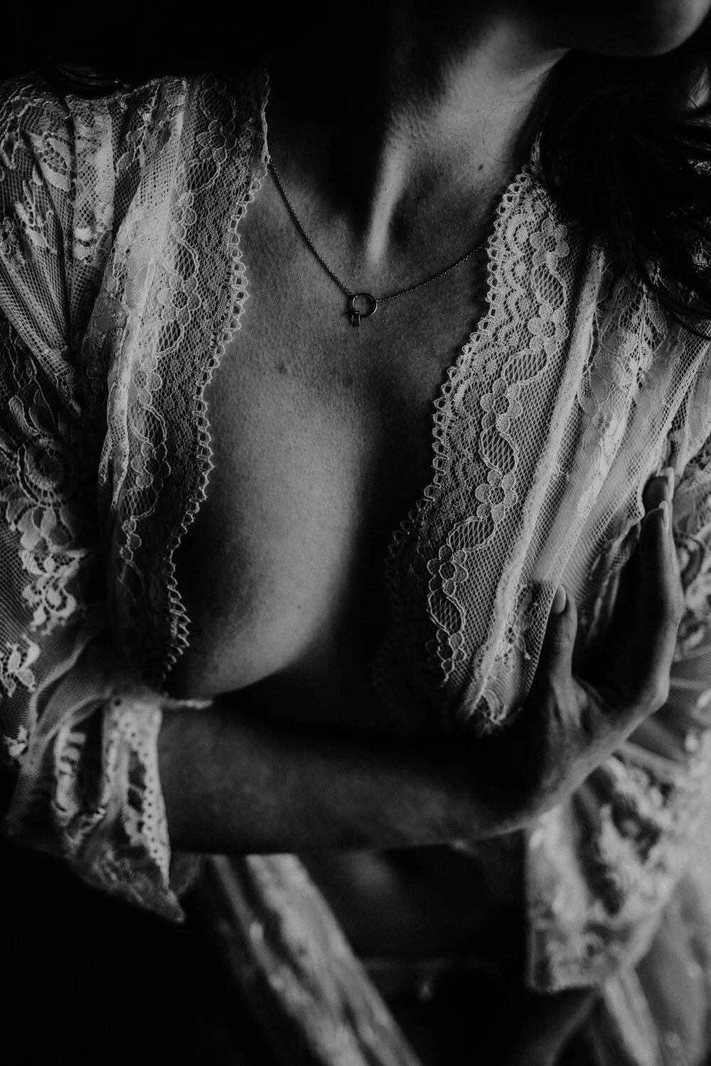  Dark and moody black and white cleavage close up.  