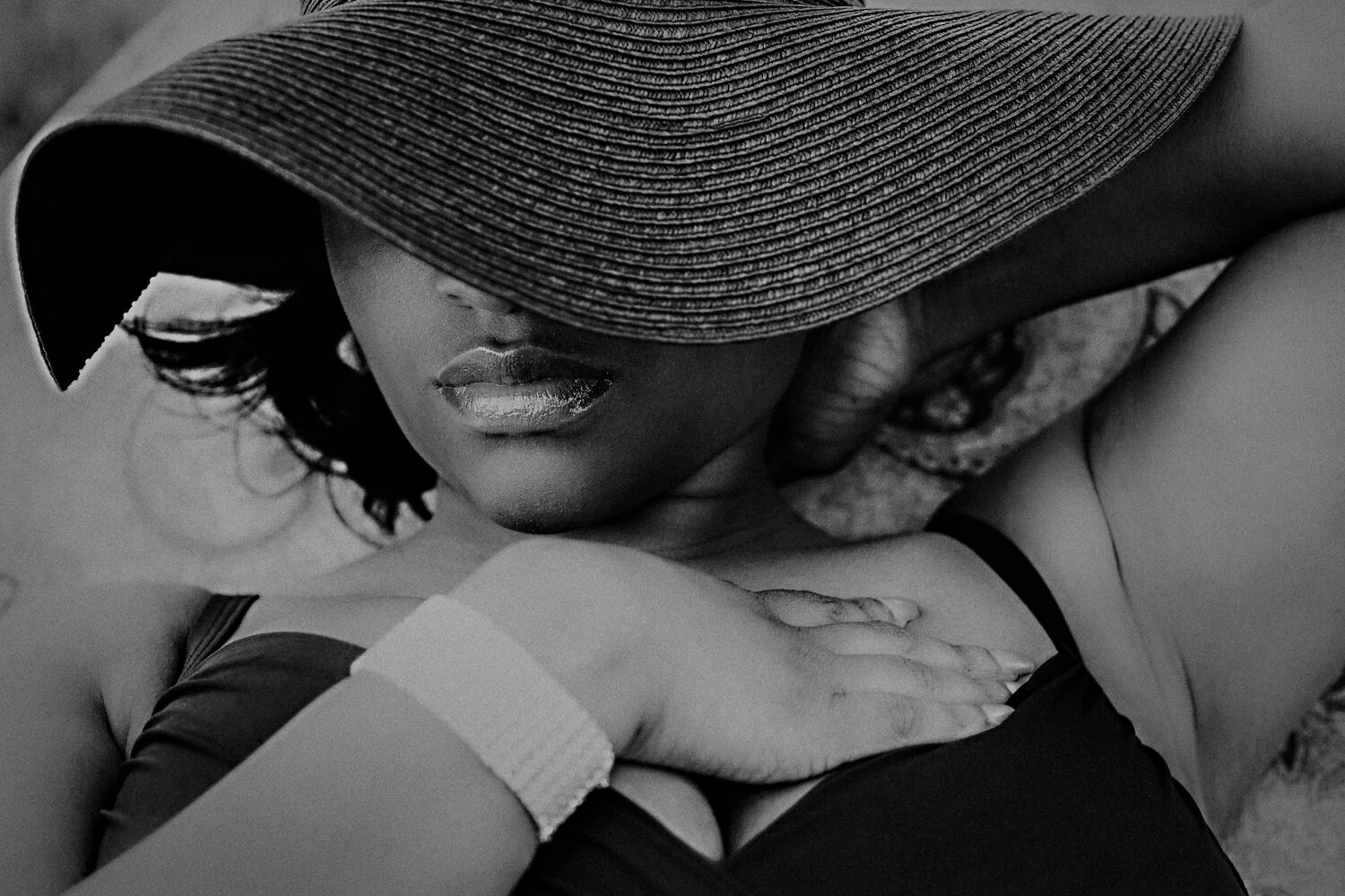  Curvy beautiful black women in large and diamond bracelet. Beautiful glossed lips. Plus size poolside outdoor boudoir.  