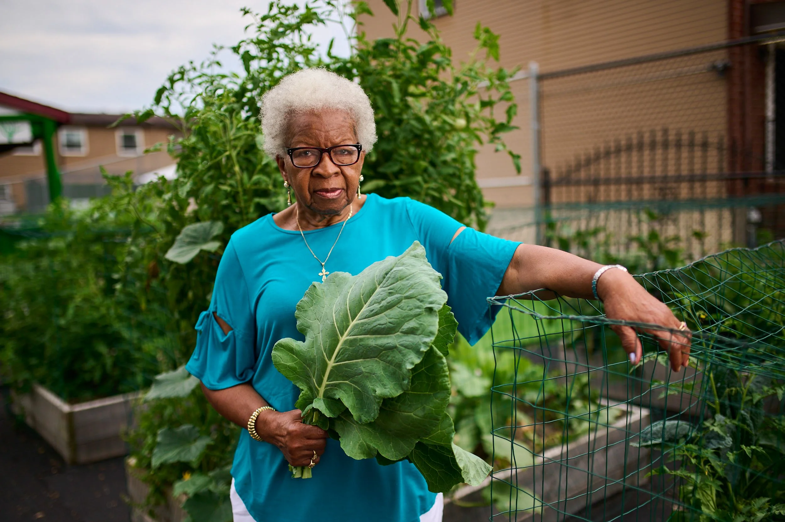 This was an eyesore. There were two abandoned buildings in this lot. Mattresses were hanging out of the window and rats were running all over. I started the garden because I was from the South and knew about the value of a garden. Plus, the garden wa