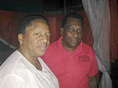 Mrs. Beckles-Robinson with Mr. Faria Hendricks at the party