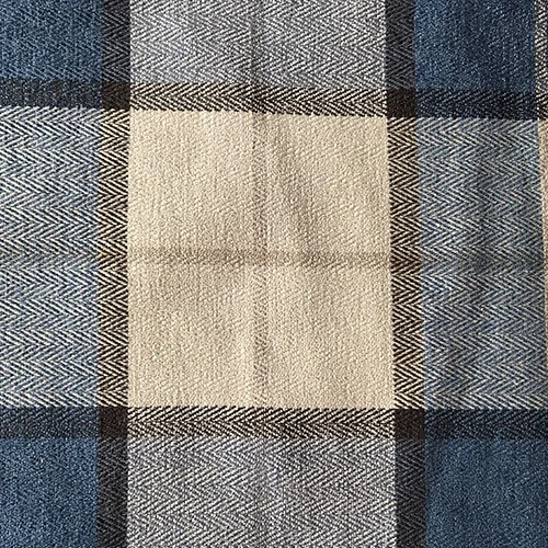 Blue Plaid Herringbone Style: Checks & Plaids ID: 15684 Color: Blue Retail Price: $18.90 per yard Content: 47.5% Polyester, 52.5% Cotton