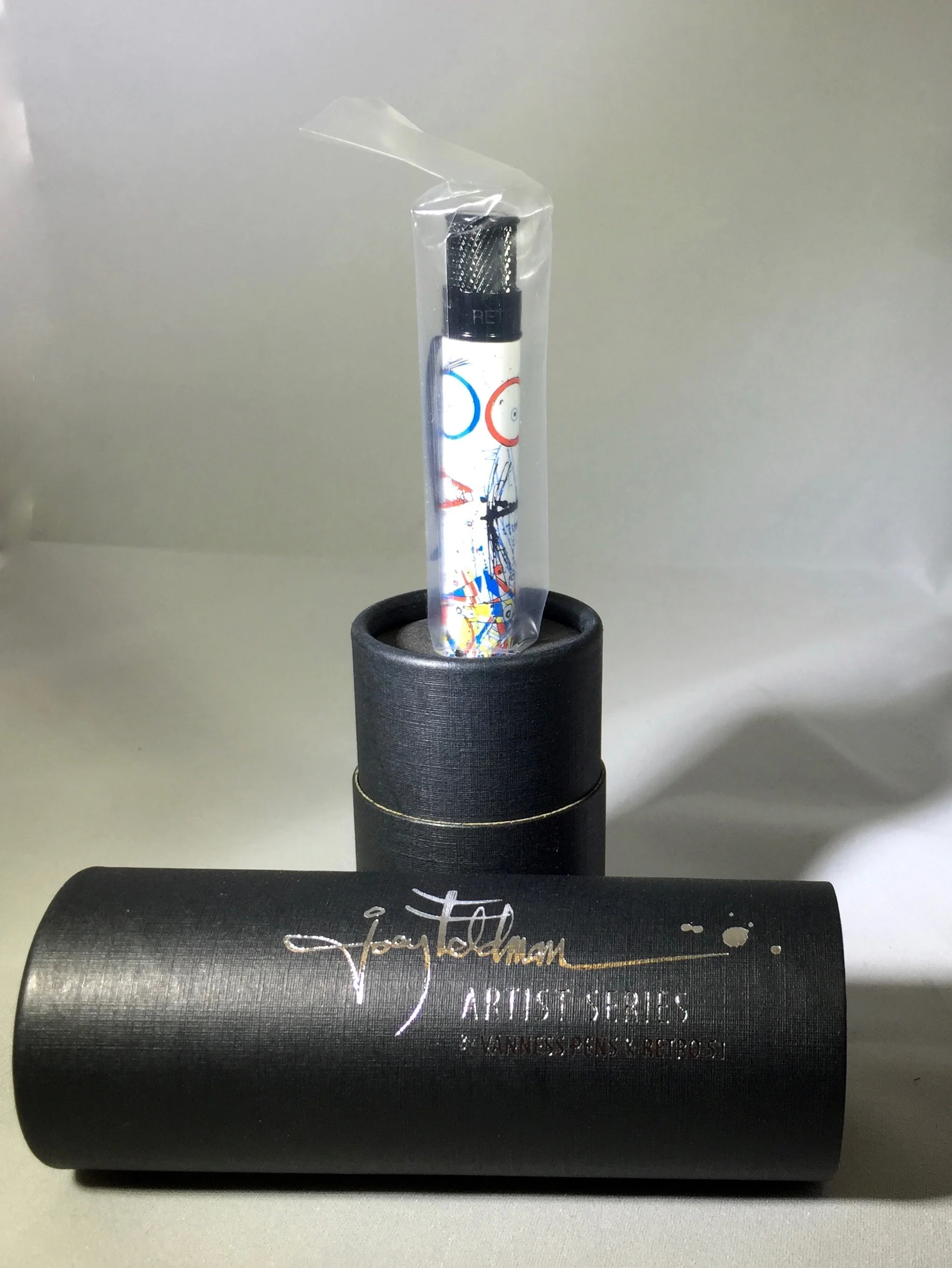 When you first open the tube, the pen is ensconced in plastic.