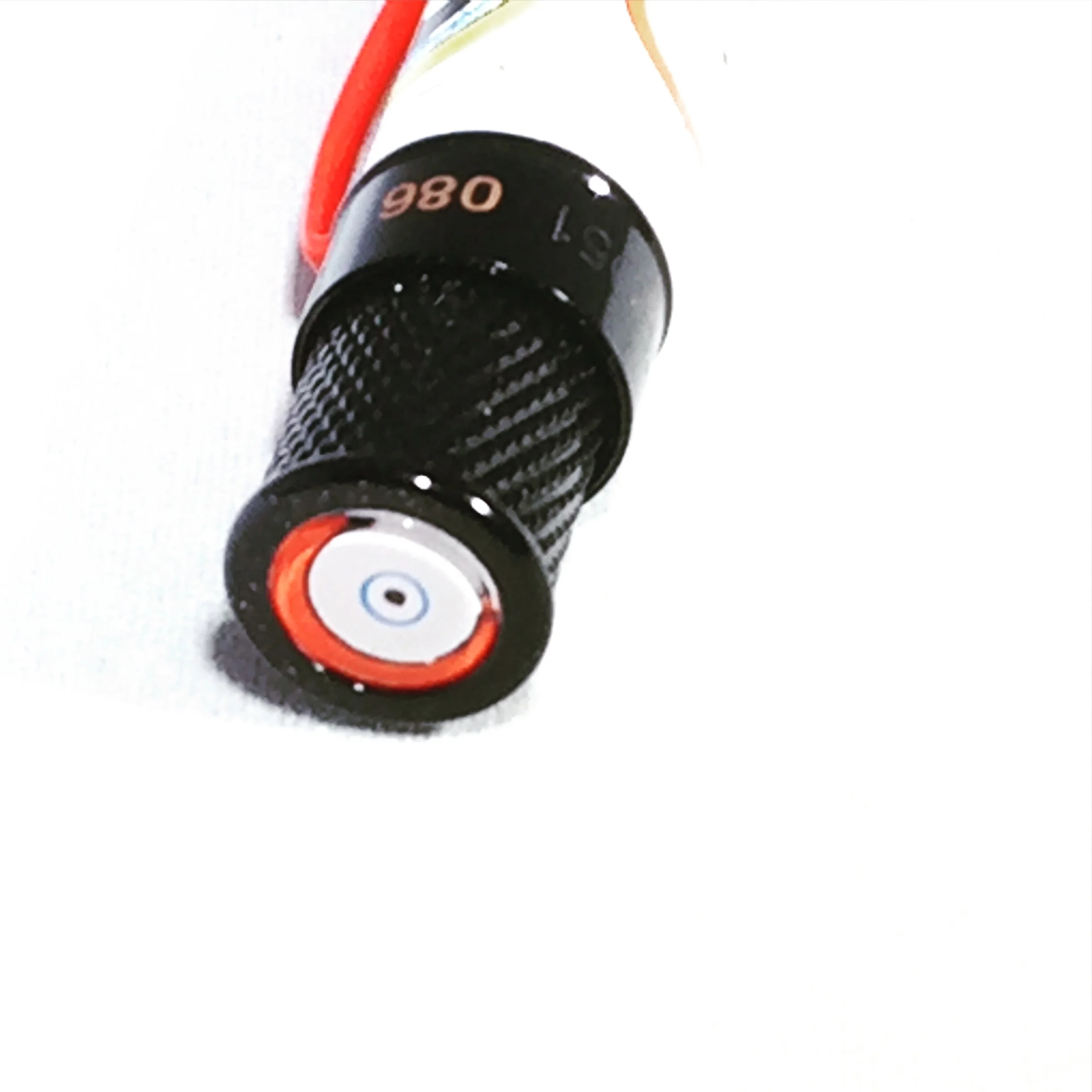 The finial is one of my favorite design touches. It features the red "eye" from Feldman's barrel design.